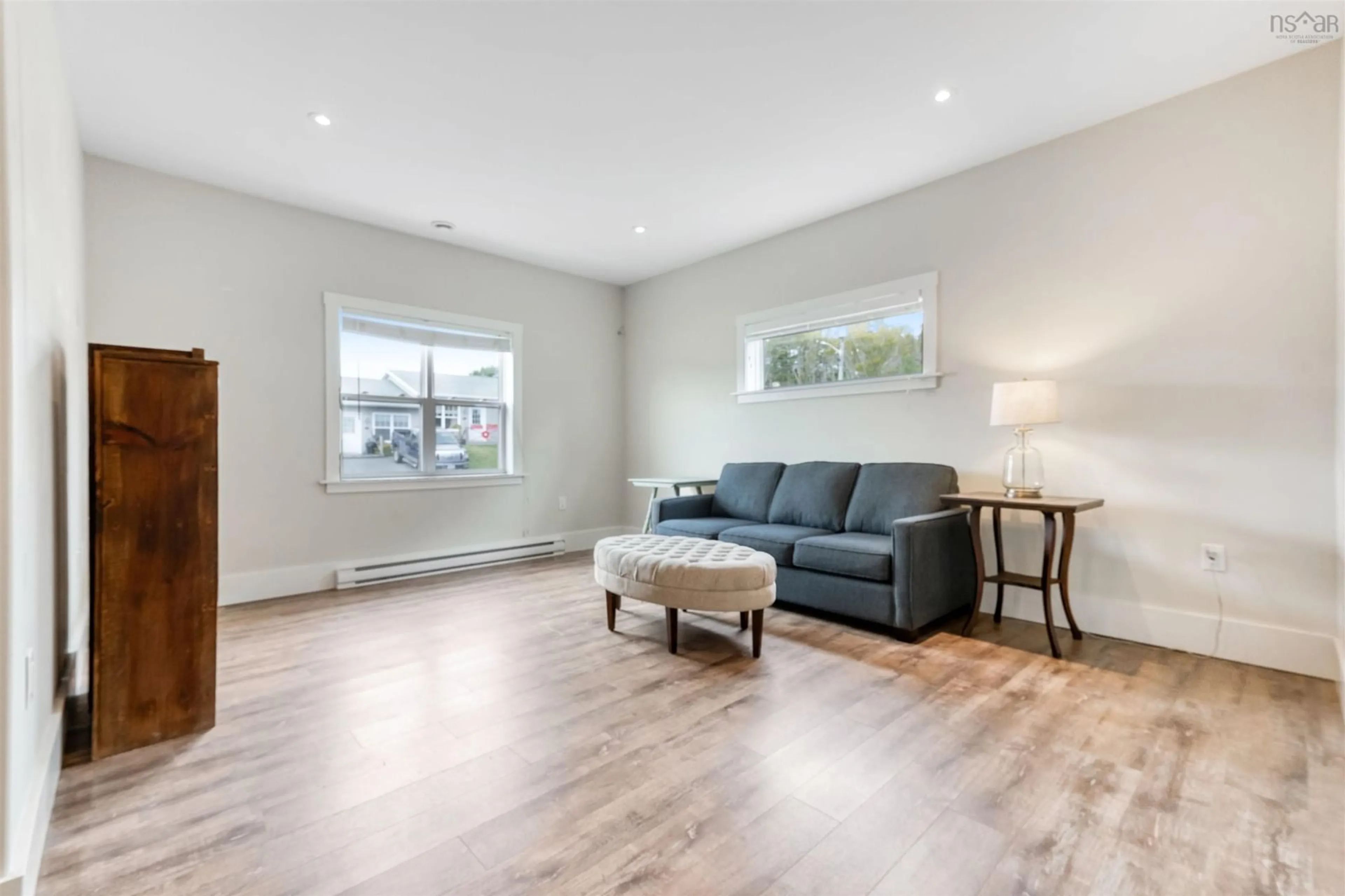 Living room with furniture, wood/laminate floor for 212 Adams St, Lunenburg Nova Scotia B0J 2C0