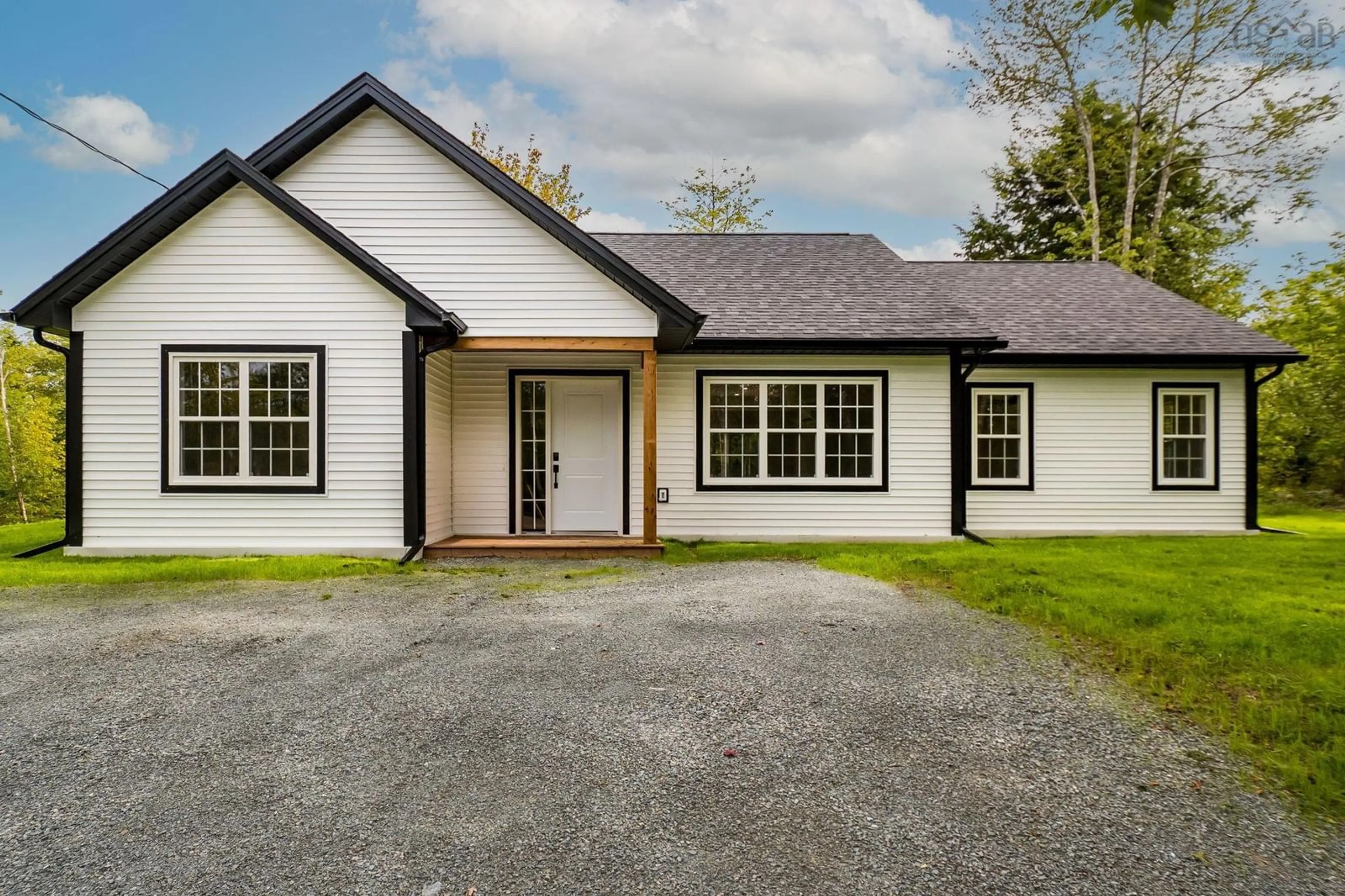 Home with vinyl exterior material, street for 20 Paces Lake Dr, Musquodoboit Harbour Nova Scotia B0J 2L0