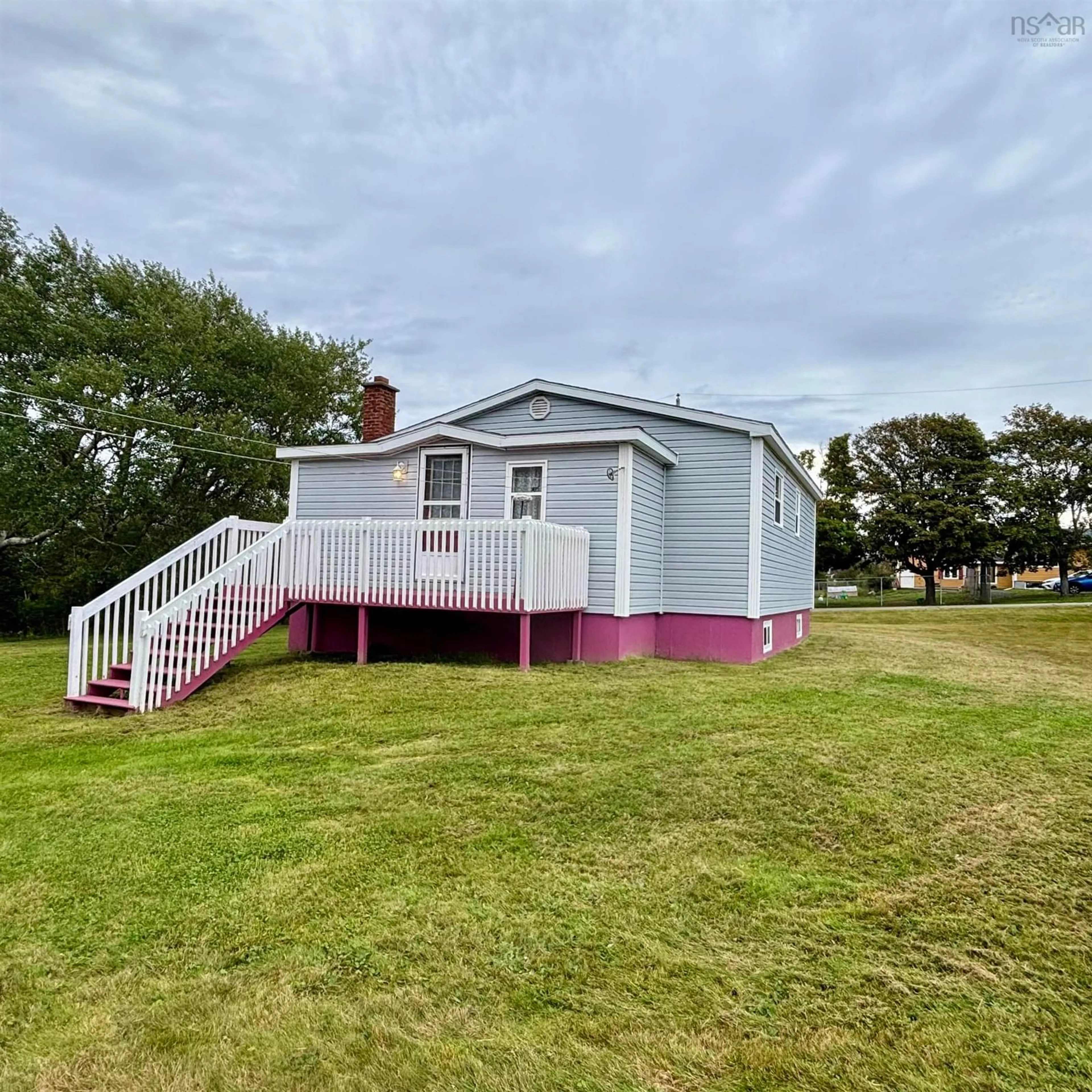 A pic from outside/outdoor area/front of a property/back of a property/a pic from drone, water/lake/river/ocean view for 743 Maple St, New Waterford Nova Scotia B1H 3R6