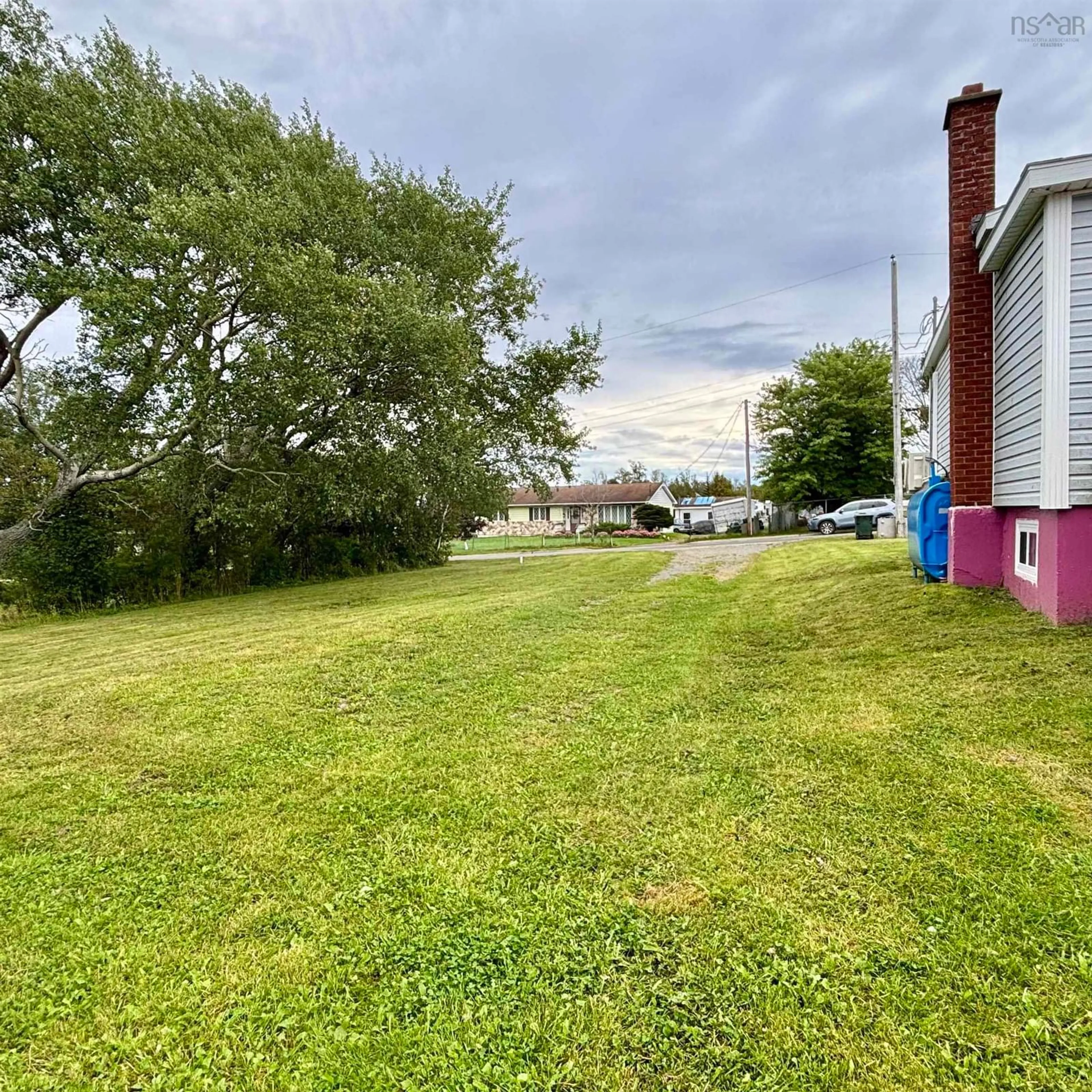 A pic from outside/outdoor area/front of a property/back of a property/a pic from drone, water/lake/river/ocean view for 743 Maple St, New Waterford Nova Scotia B1H 3R6