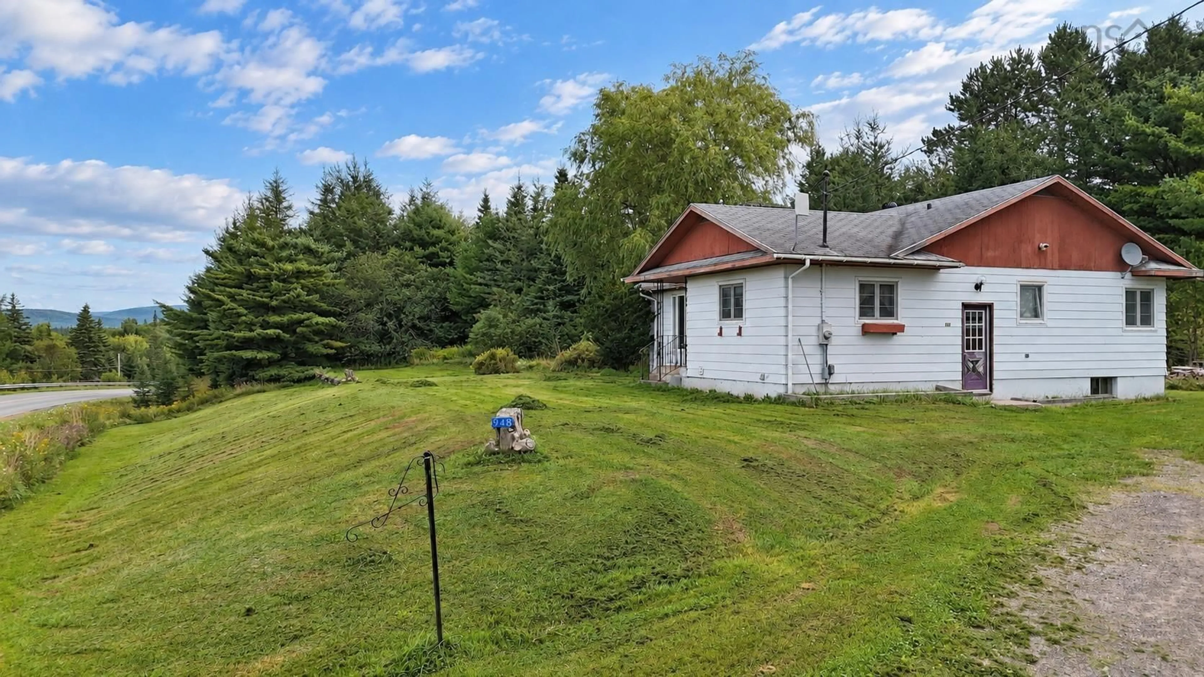 A pic from outside/outdoor area/front of a property/back of a property/a pic from drone, unknown for 948 Big Baddeck Rd, Big Baddeck Nova Scotia B0E 1B0