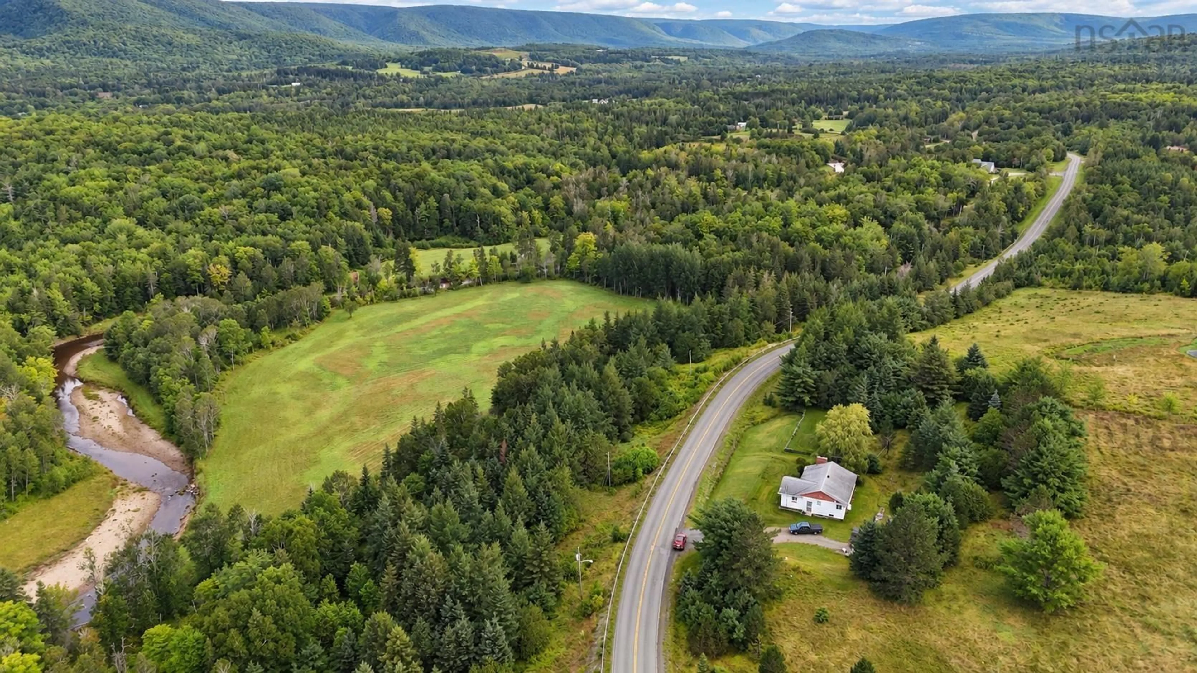 A pic from outside/outdoor area/front of a property/back of a property/a pic from drone, mountain view for 948 Big Baddeck Rd, Big Baddeck Nova Scotia B0E 1B0