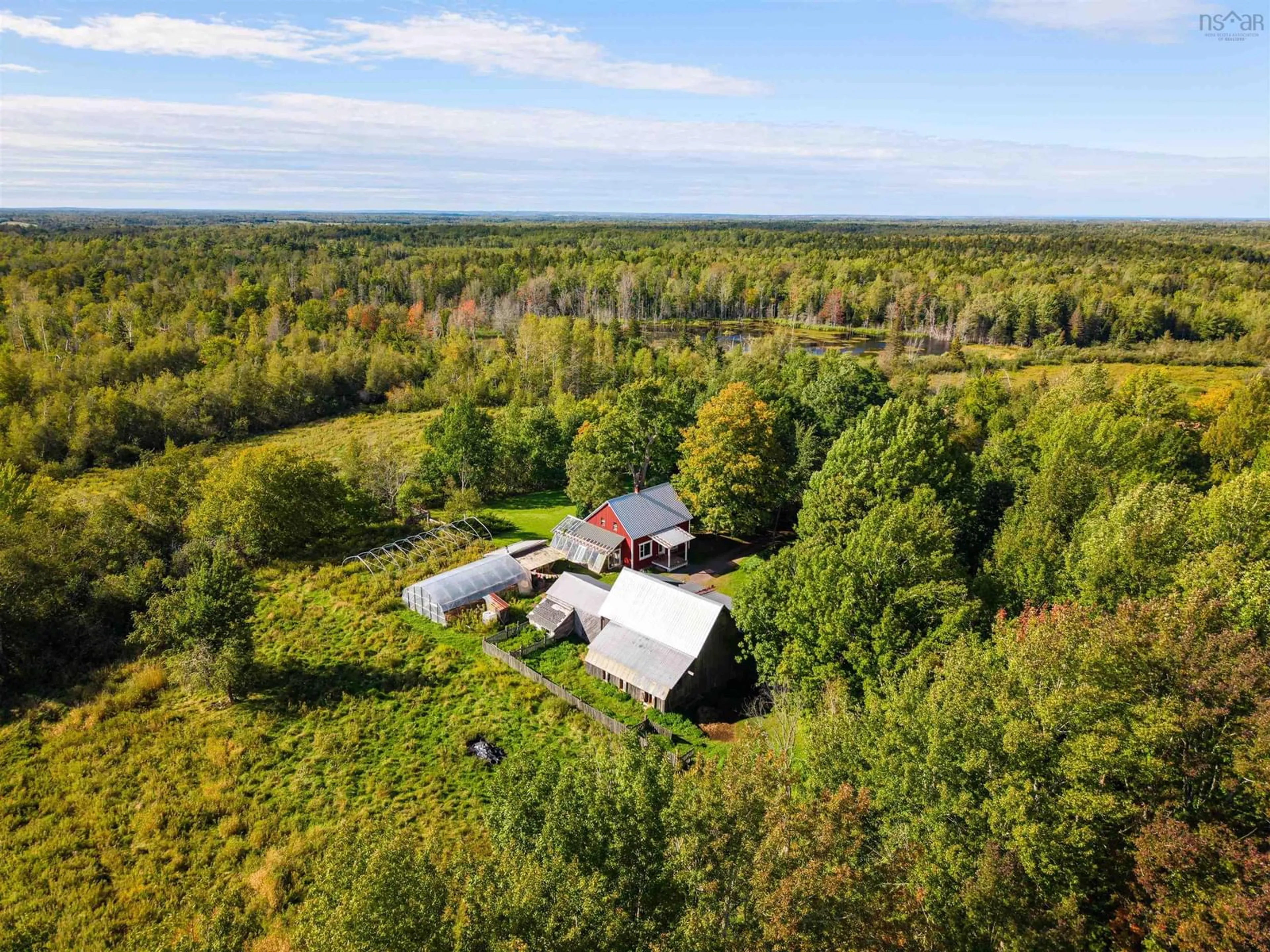 A pic from outside/outdoor area/front of a property/back of a property/a pic from drone, forest/trees view for 3082 Balmoral Rd, Earltown Nova Scotia B0K 1V0
