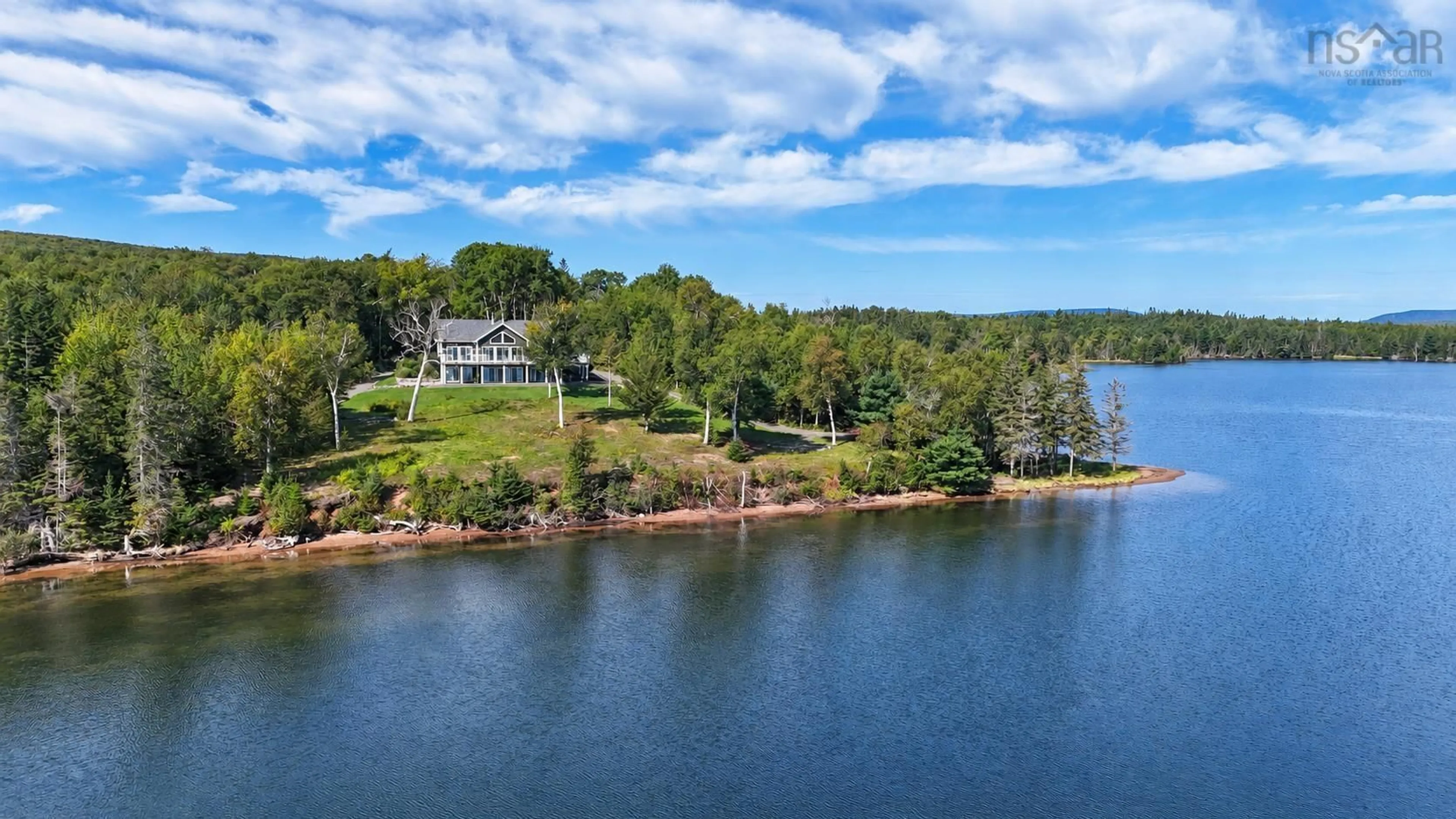 A pic from outside/outdoor area/front of a property/back of a property/a pic from drone, water/lake/river/ocean view for 7548 Marble Mountain Rd, Malagawatch Nova Scotia B0E 1M0