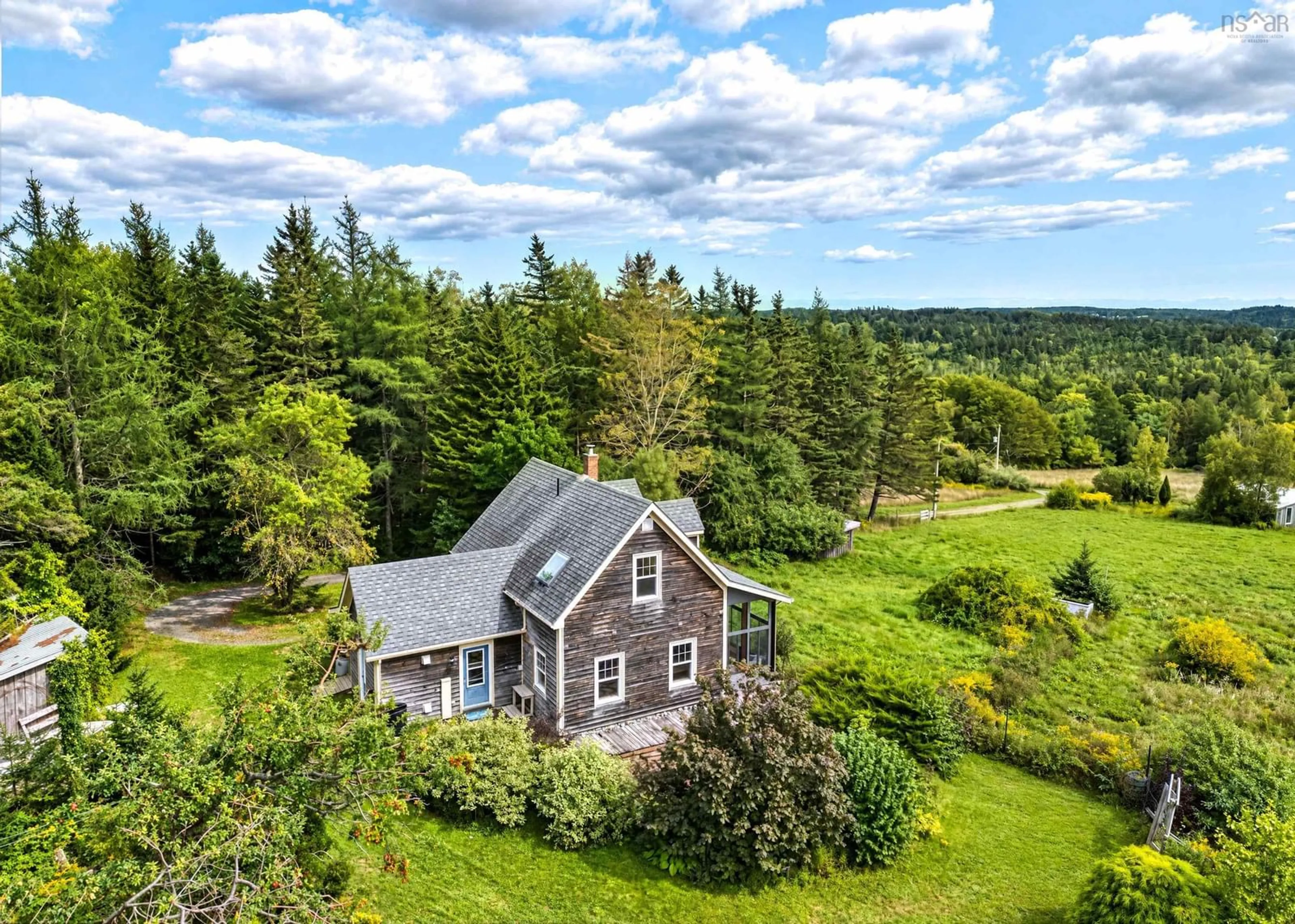A pic from outside/outdoor area/front of a property/back of a property/a pic from drone, water/lake/river/ocean view for 1690 New Cumberland Rd, Pleasantville Nova Scotia B0R 1G0