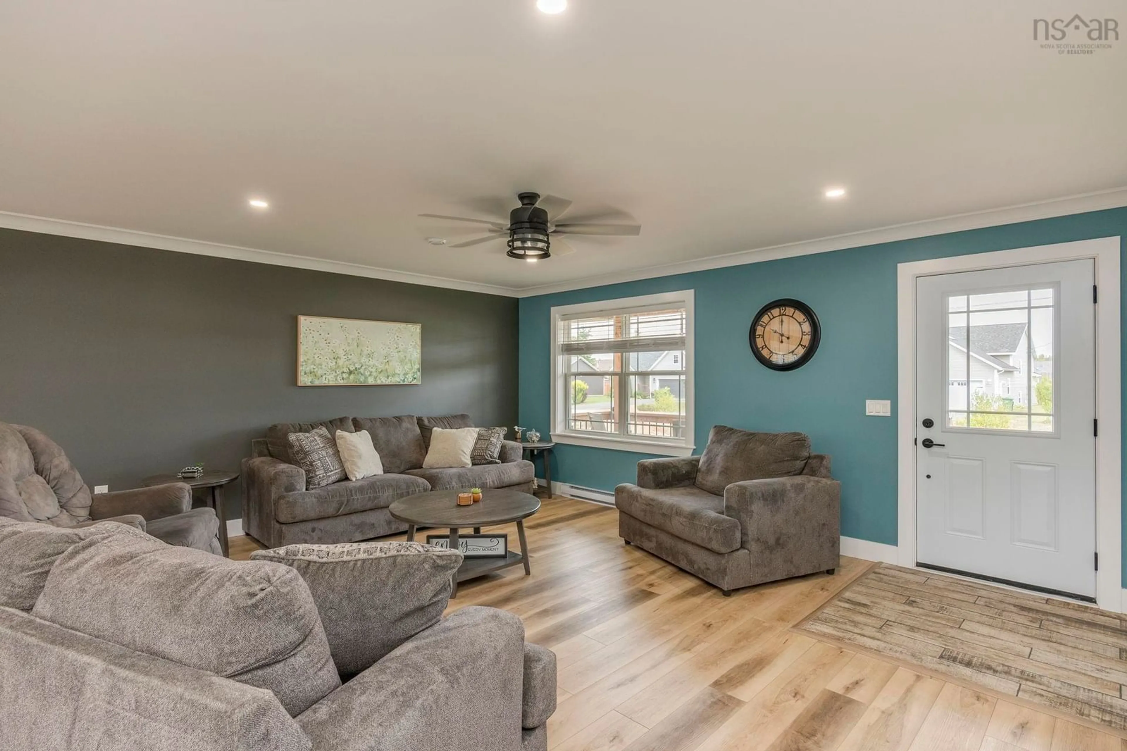 Living room with furniture, wood/laminate floor for 44 Acorn Lane, Kingston Nova Scotia B0P 1R0