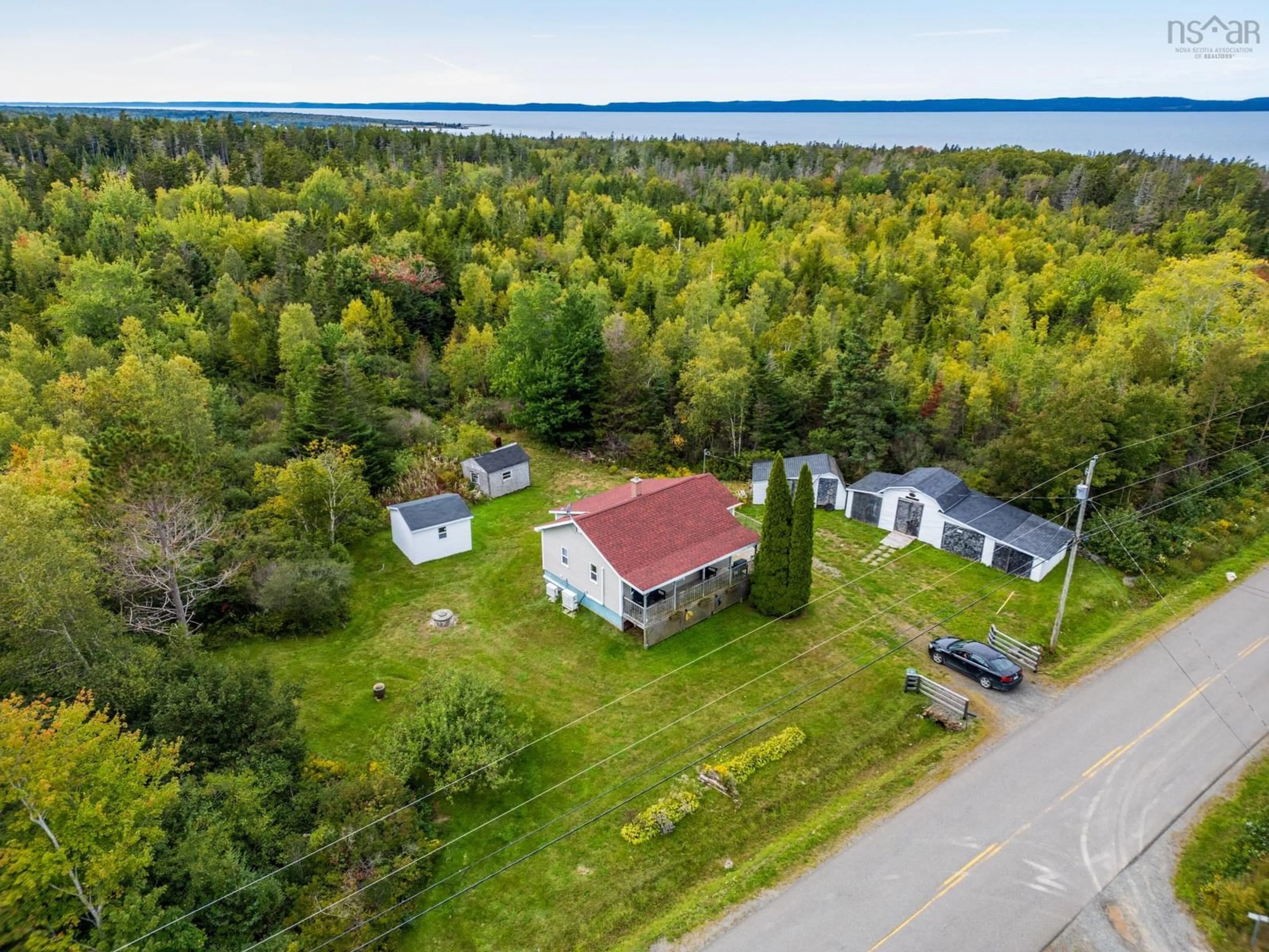 A pic from outside/outdoor area/front of a property/back of a property/a pic from drone, water/lake/river/ocean view for 136 French Rd, Plympton Nova Scotia B0W 2R0