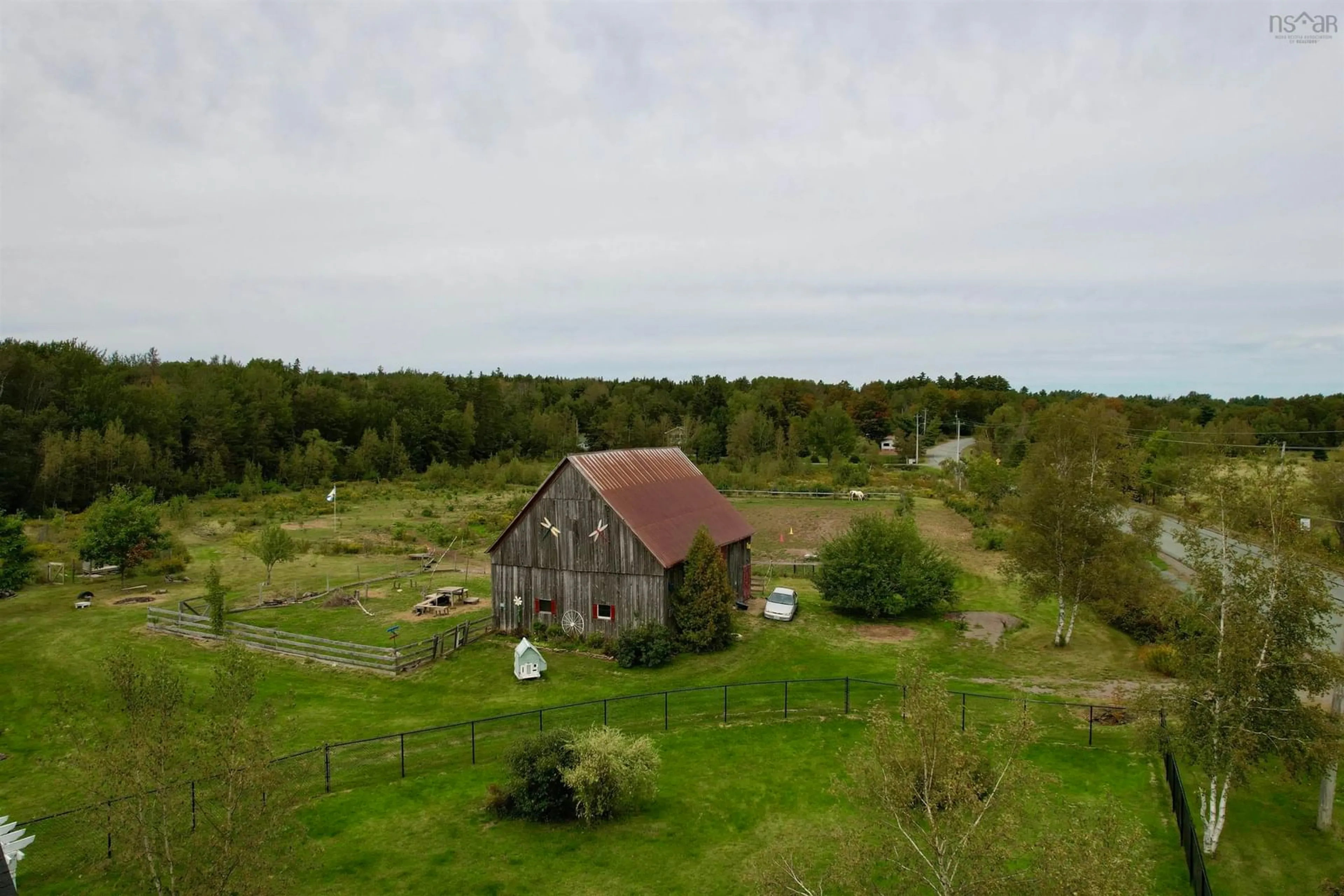 A pic from outside/outdoor area/front of a property/back of a property/a pic from drone, unknown for 2151 Wyvern Rd, River Philip Nova Scotia B0M 1V0