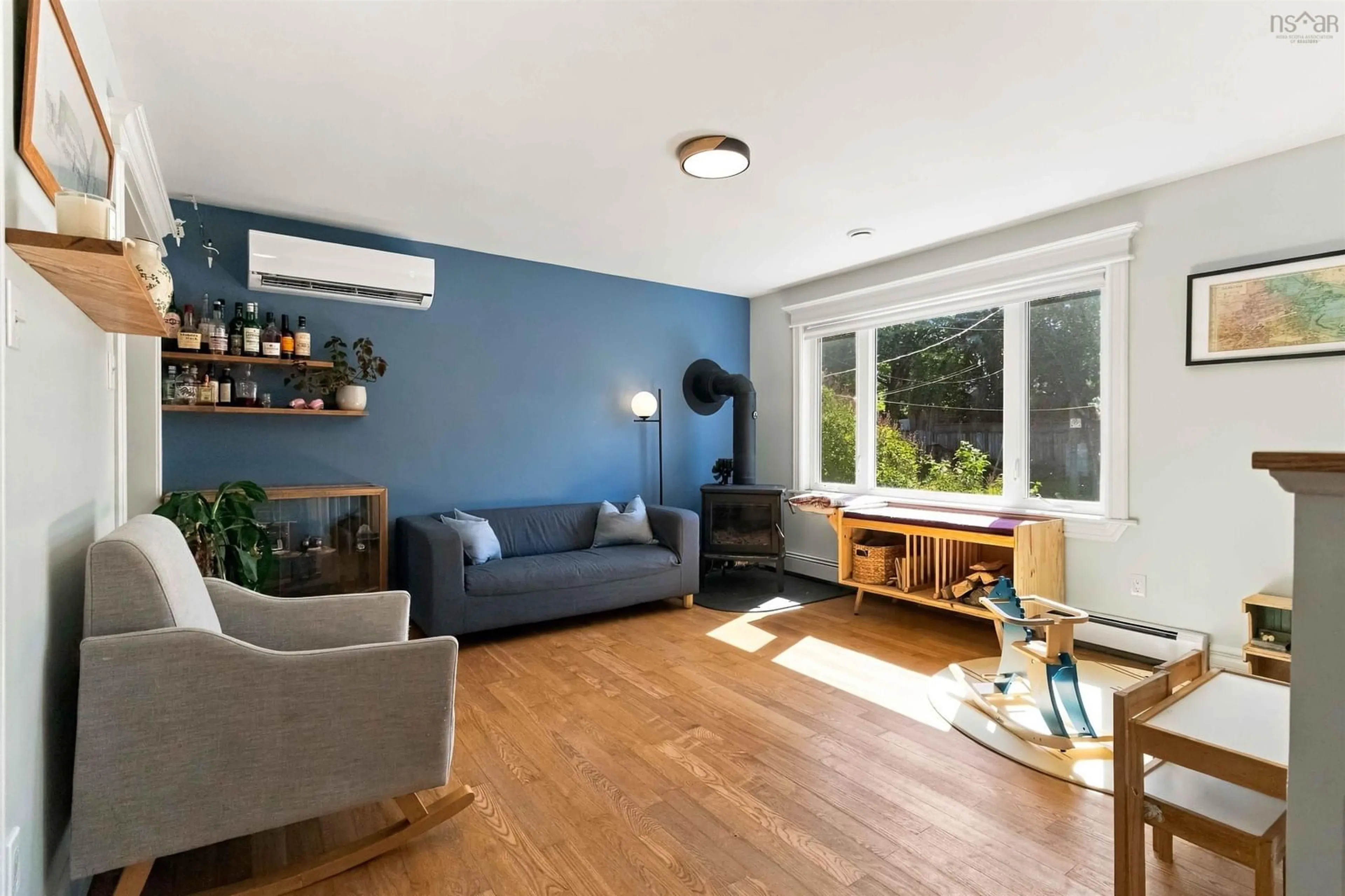 Living room with furniture, wood/laminate floor for 5 Marriott St, Halifax Regional Municipality Nova Scotia B3N 1V2