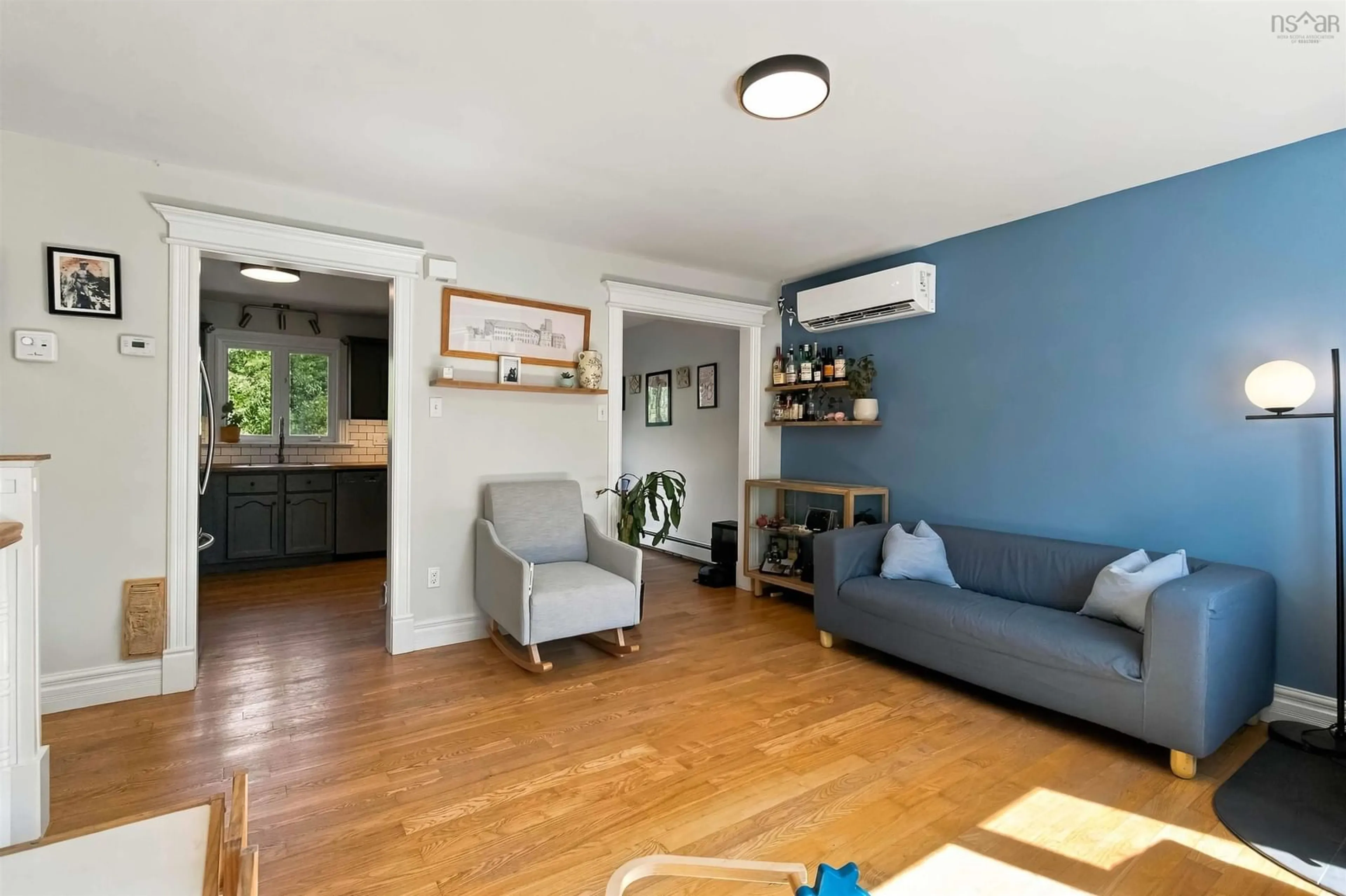 Living room with furniture, wood/laminate floor for 5 Marriott St, Halifax Regional Municipality Nova Scotia B3N 1V2