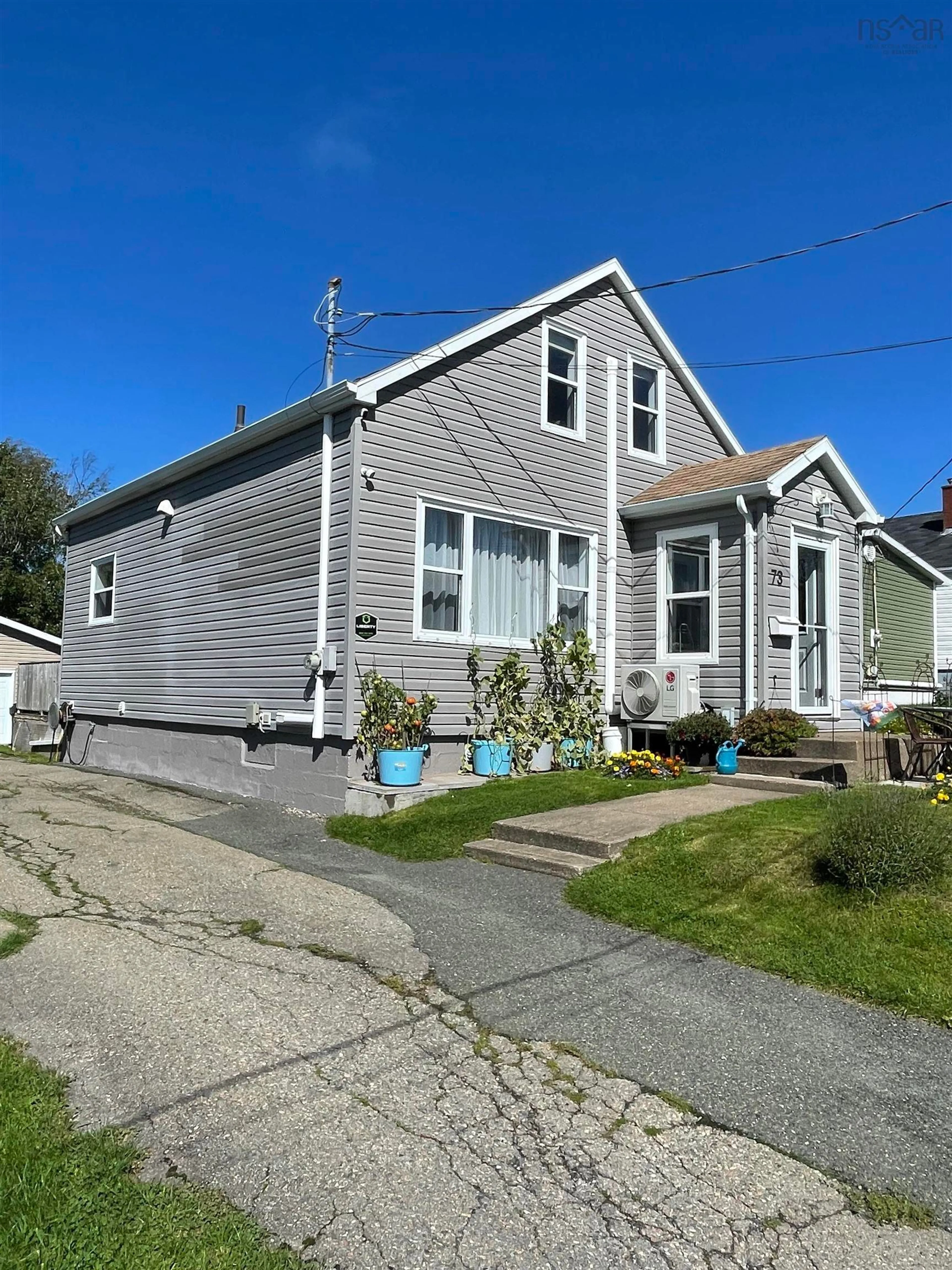 Home with vinyl exterior material, street for 73 Brown Street, Sydney Nova Scotia B1S 2M6