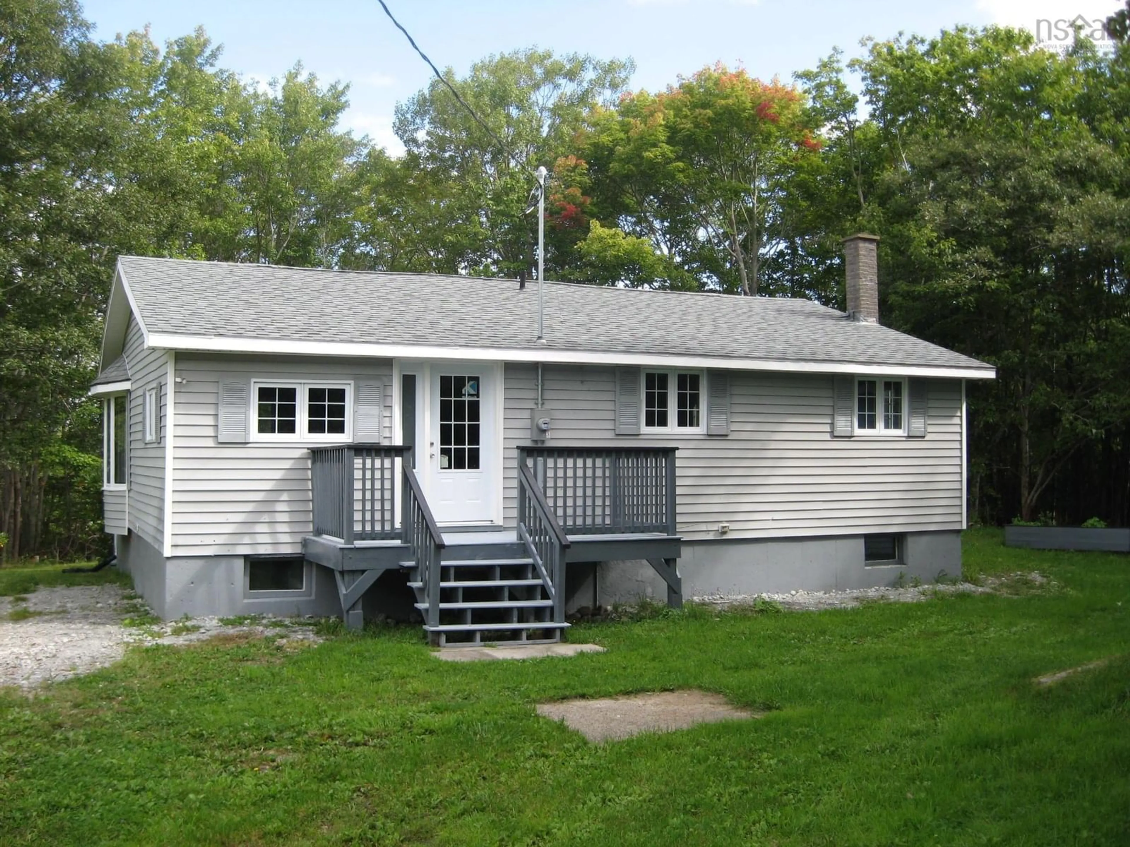 Home with vinyl exterior material, street for 379 Old Port Mouton Rd, White Point Nova Scotia B0T 1G0
