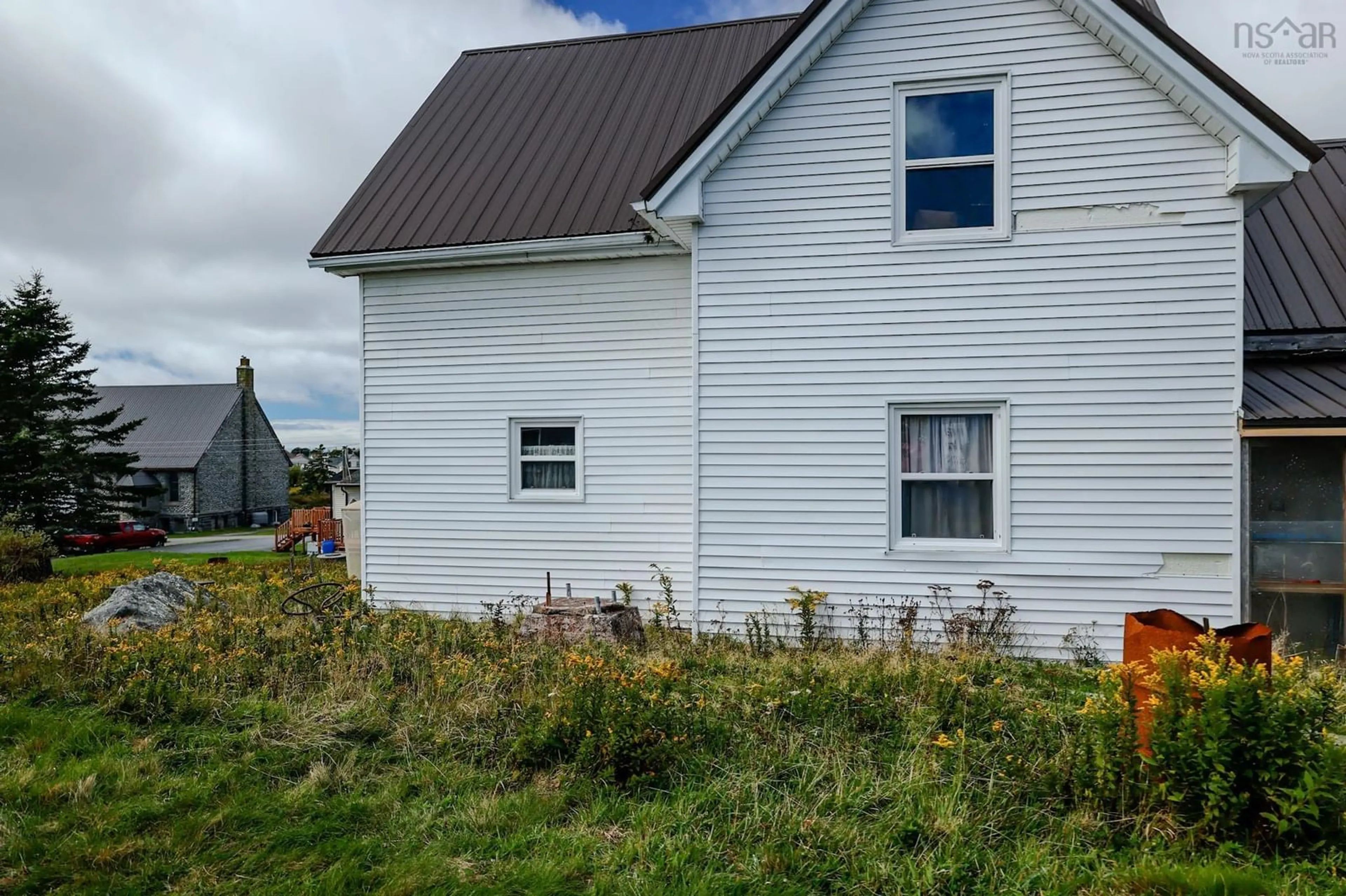 Home with vinyl exterior material, building for 32 Church Rd, Clark's Harbour Nova Scotia B0W 1P0