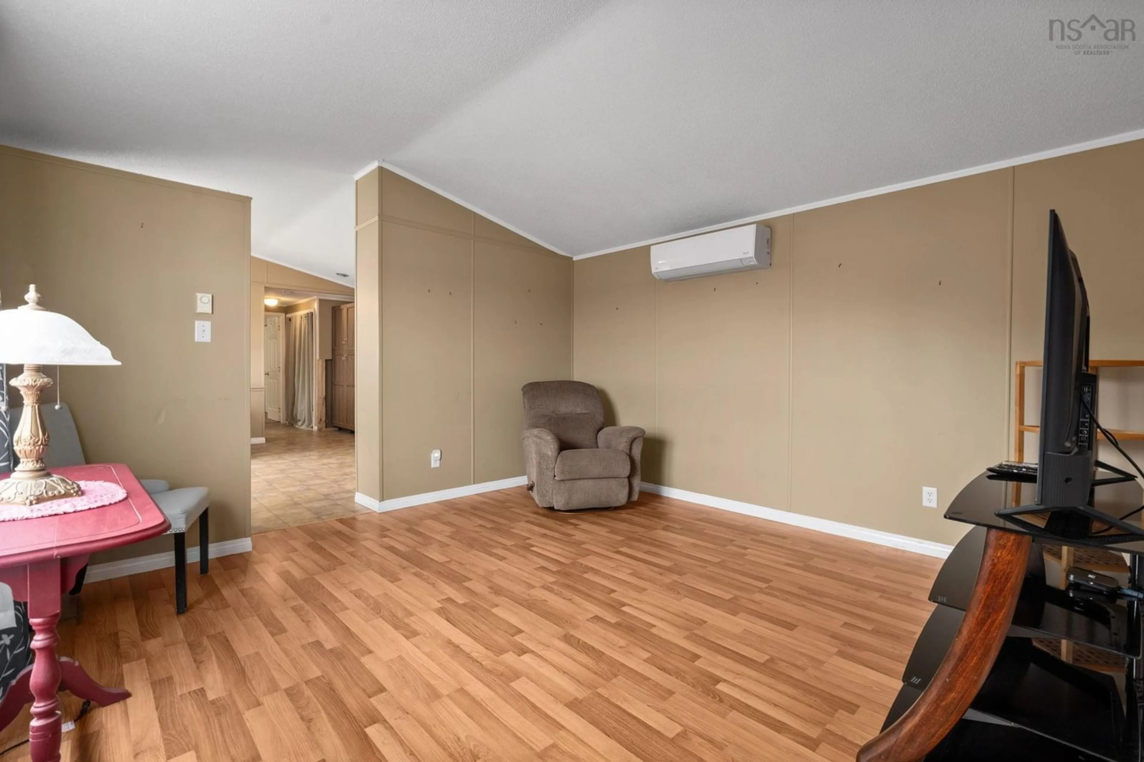 Living room with furniture, wood/laminate floor for 28 Cedar Lane, Eastern Passage Nova Scotia B3G 1S7