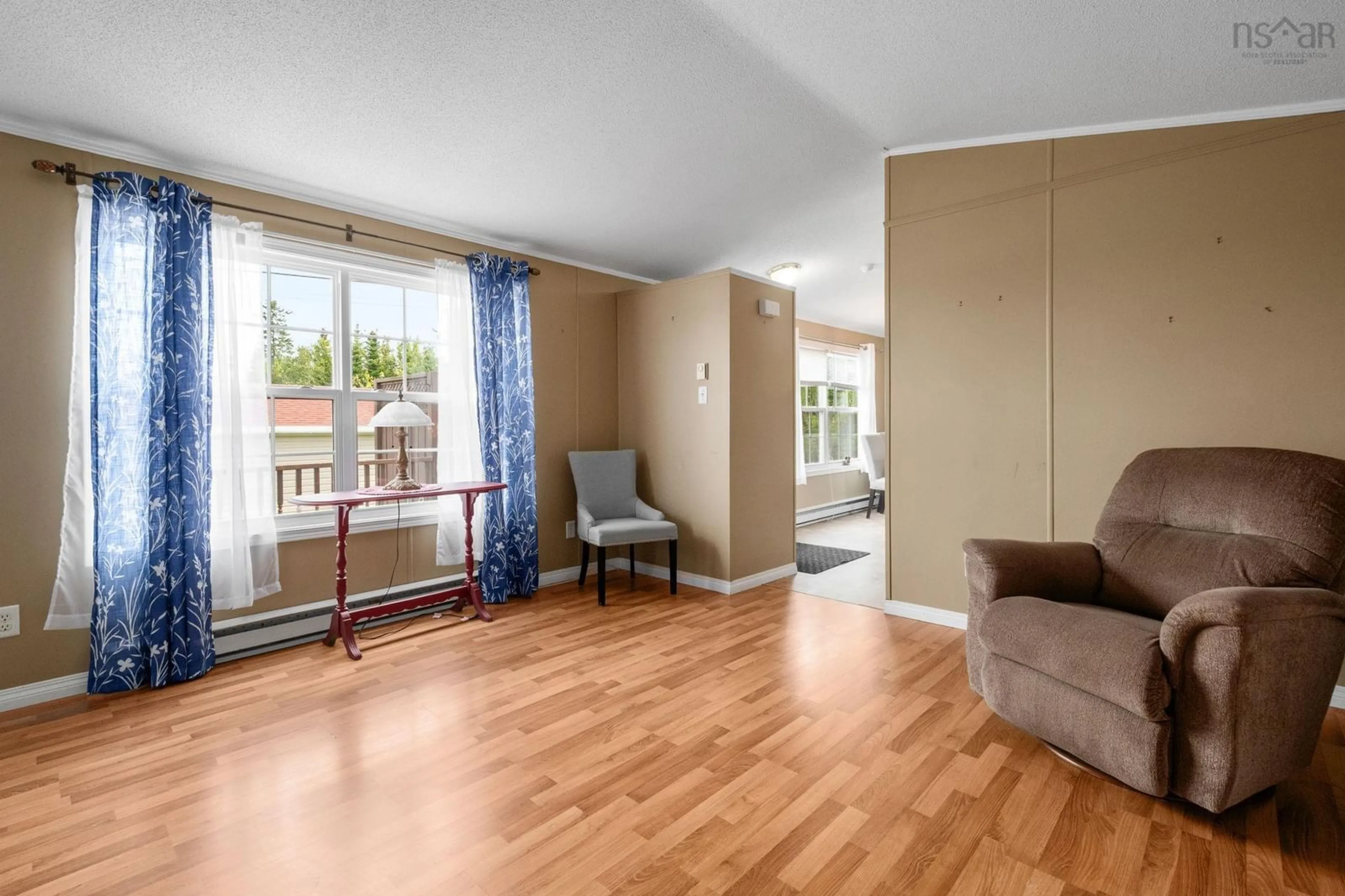 Living room with furniture, wood/laminate floor for 28 Cedar Lane, Eastern Passage Nova Scotia B3G 1S7
