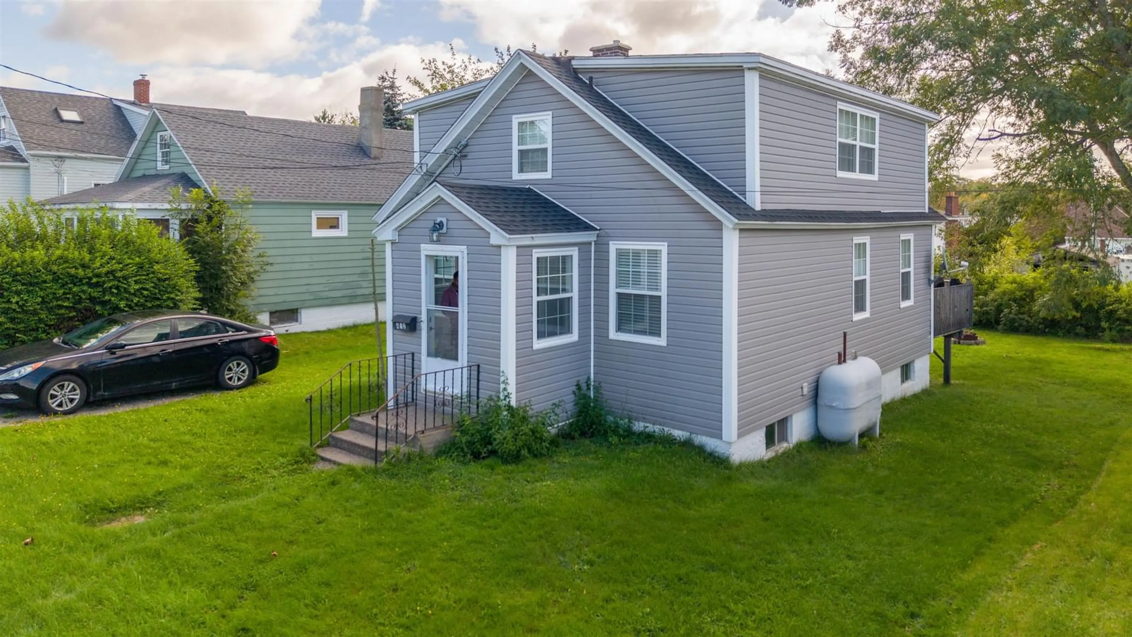 Home with vinyl exterior material, street for 412 Atlantic St, Sydney Nova Scotia B1P 3R8