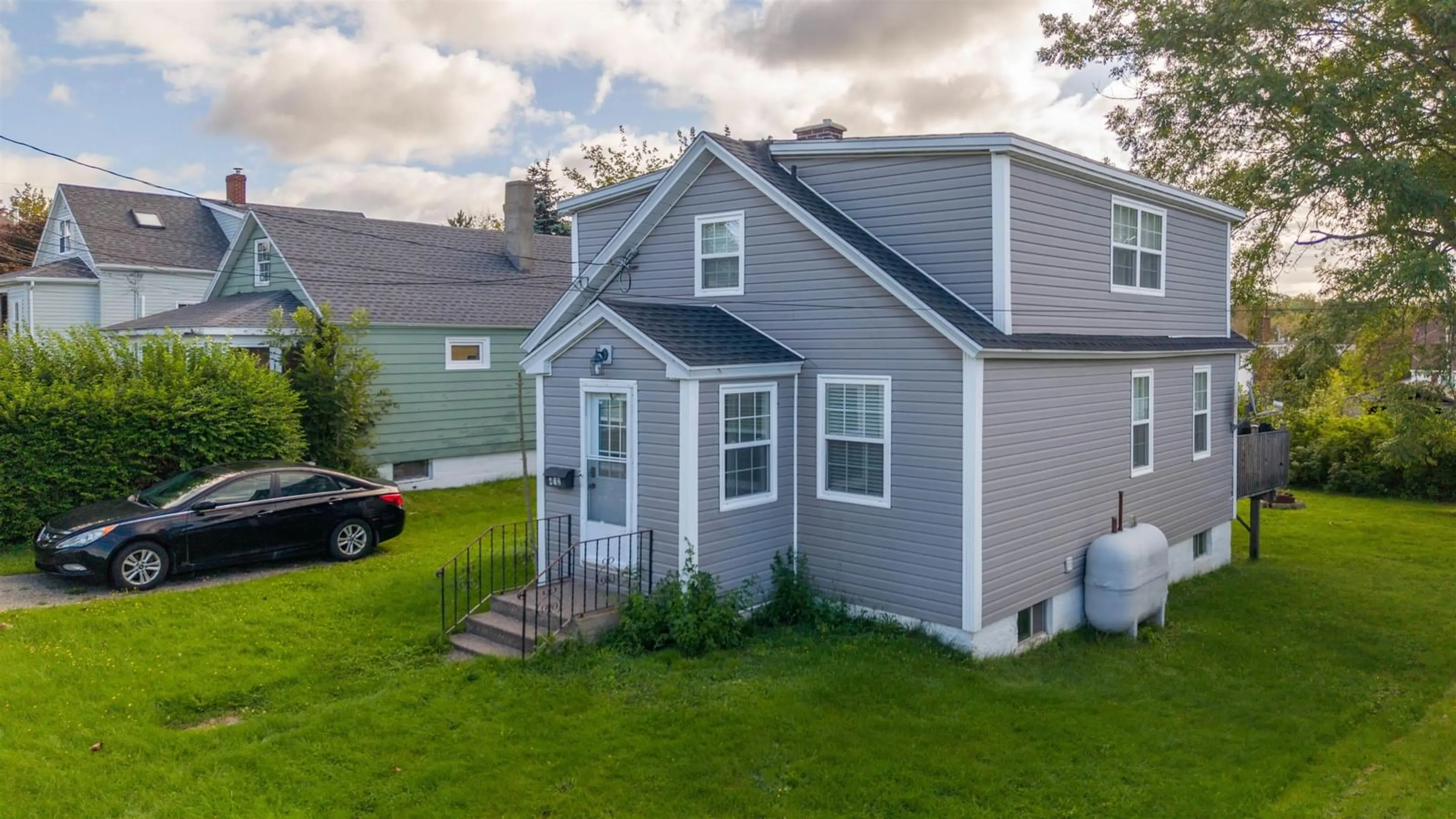Home with vinyl exterior material, street for 412 Atlantic St, Sydney Nova Scotia B1P 3R8
