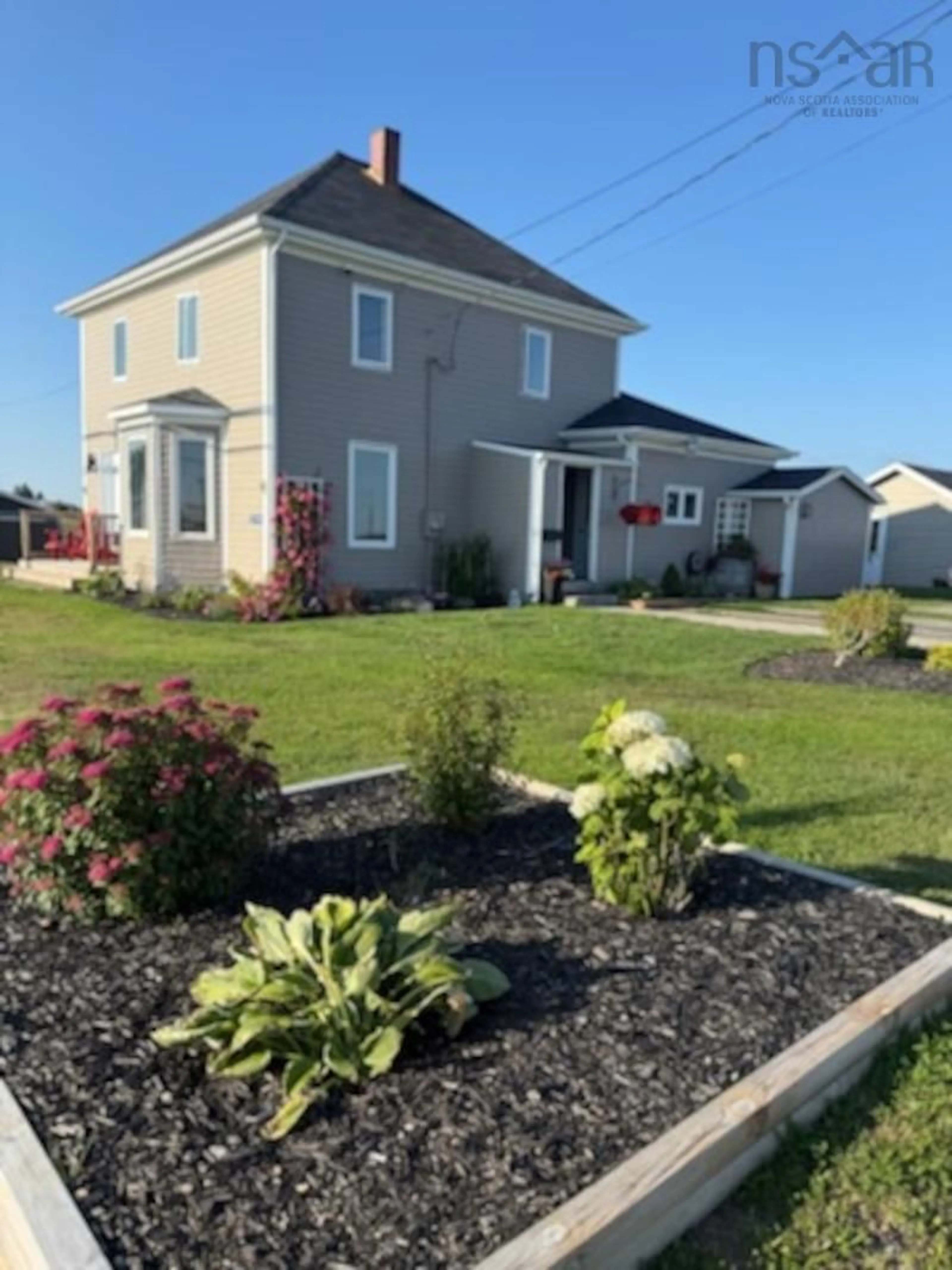 A pic from outside/outdoor area/front of a property/back of a property/a pic from drone, street for 10194 Highway 1 Hwy, Saulnierville Nova Scotia B0W 2Z0