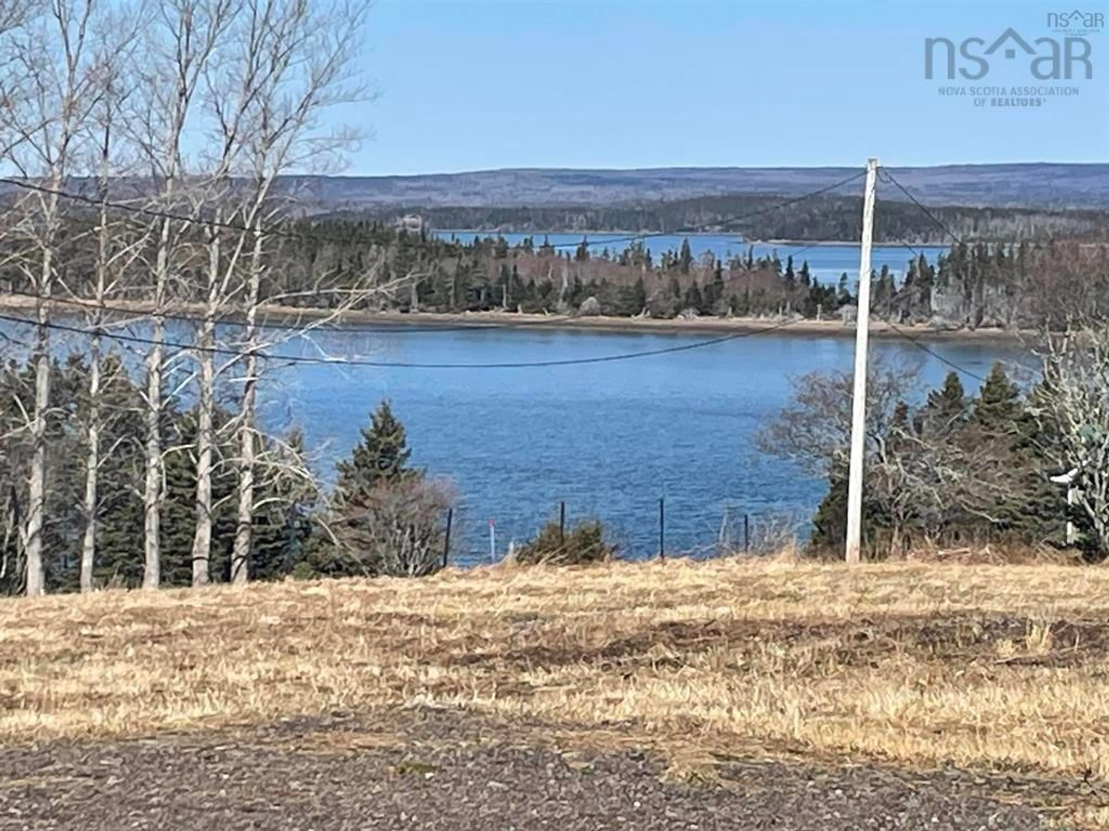 A pic from outside/outdoor area/front of a property/back of a property/a pic from drone, water/lake/river/ocean view for 27 Descousse-Cap La Ronde Rd, D'Escousse Nova Scotia B0E 1K0