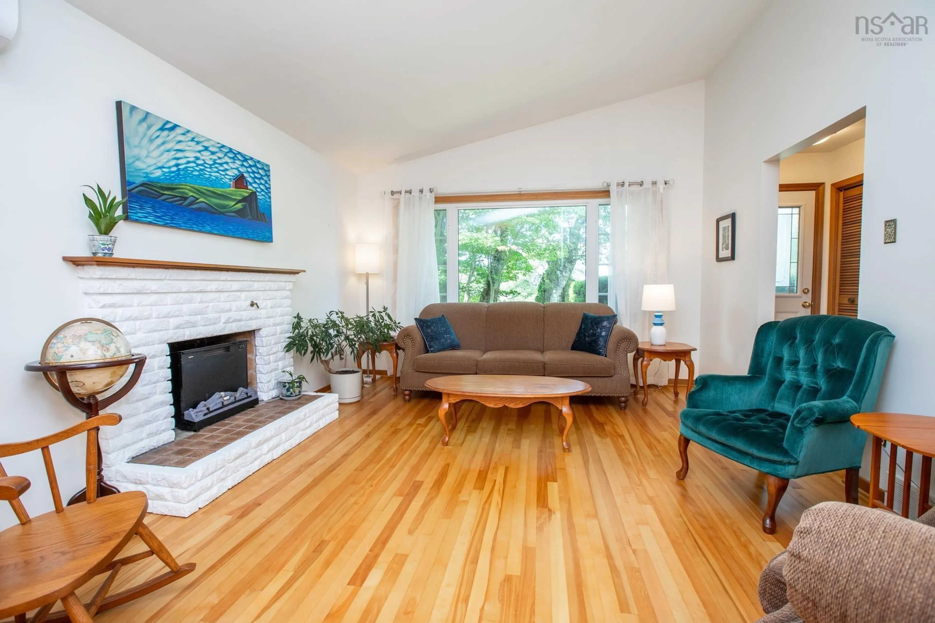 Living room with furniture, wood/laminate floor for 1 Tummell Dr, Dartmouth Nova Scotia B2X 2A7