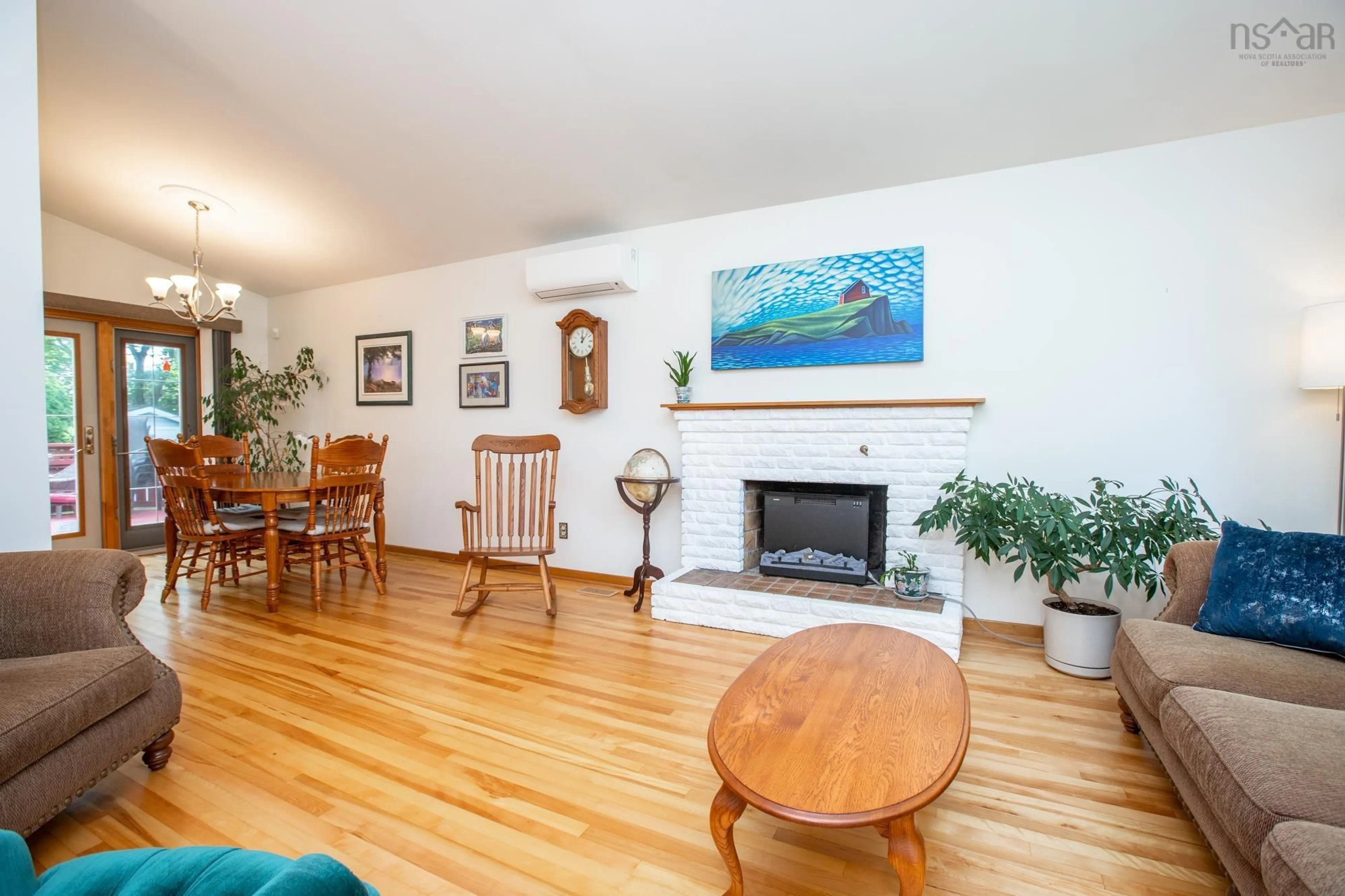 Living room with furniture, wood/laminate floor for 1 Tummell Dr, Dartmouth Nova Scotia B2X 2A7