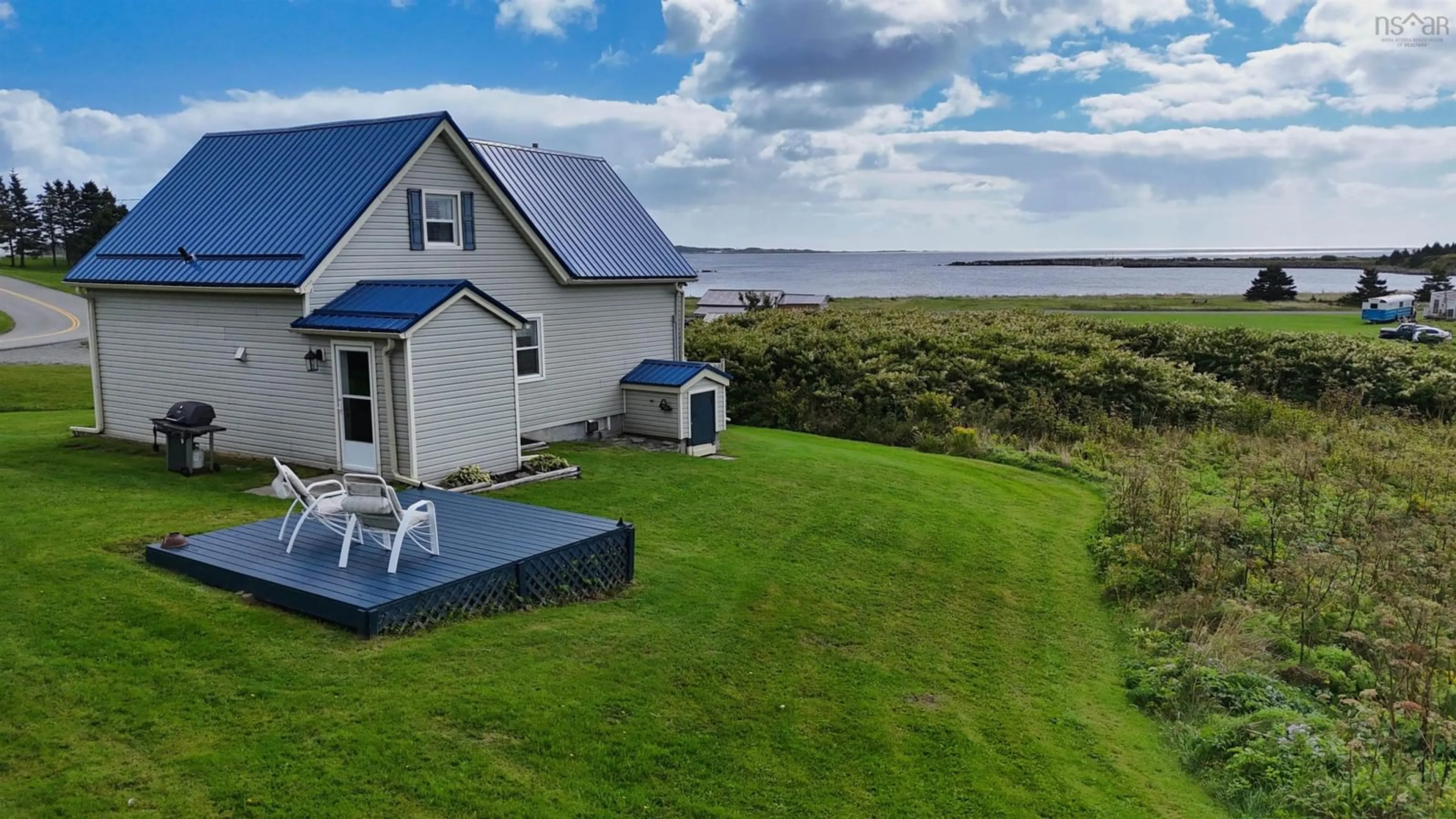 A pic from outside/outdoor area/front of a property/back of a property/a pic from drone, water/lake/river/ocean view for 118 Chapel Cove Rd, L'Ardoise Nova Scotia B0E 2X0