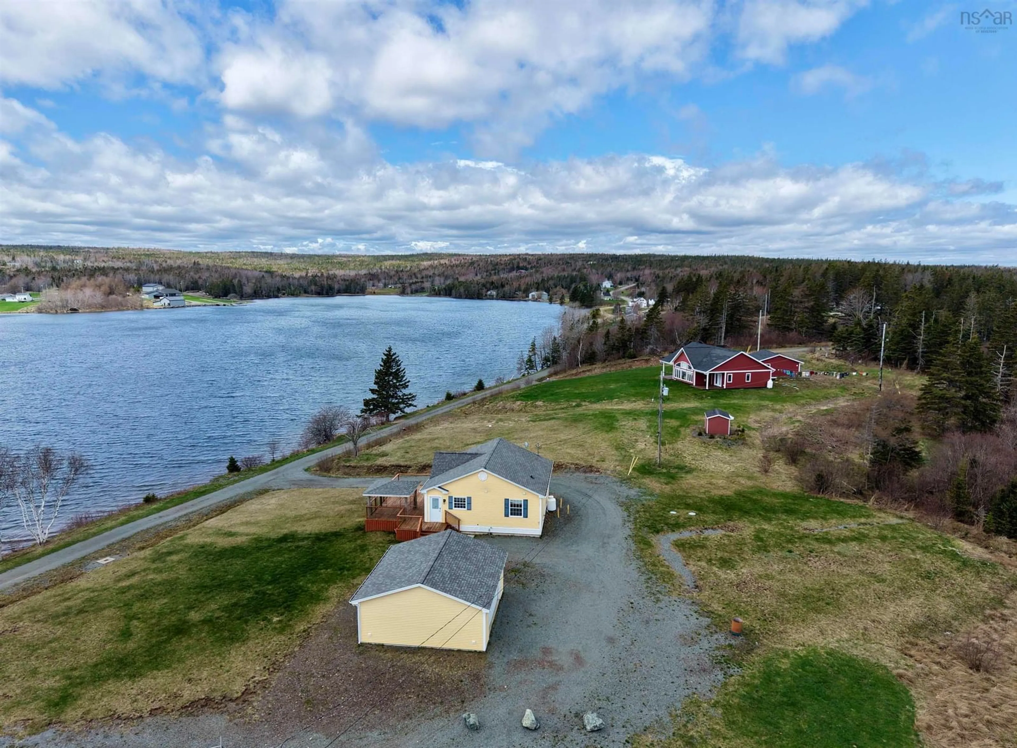 A pic from outside/outdoor area/front of a property/back of a property/a pic from drone, water/lake/river/ocean view for 153 Burkes Rd., French Cove Nova Scotia B0E 3B0