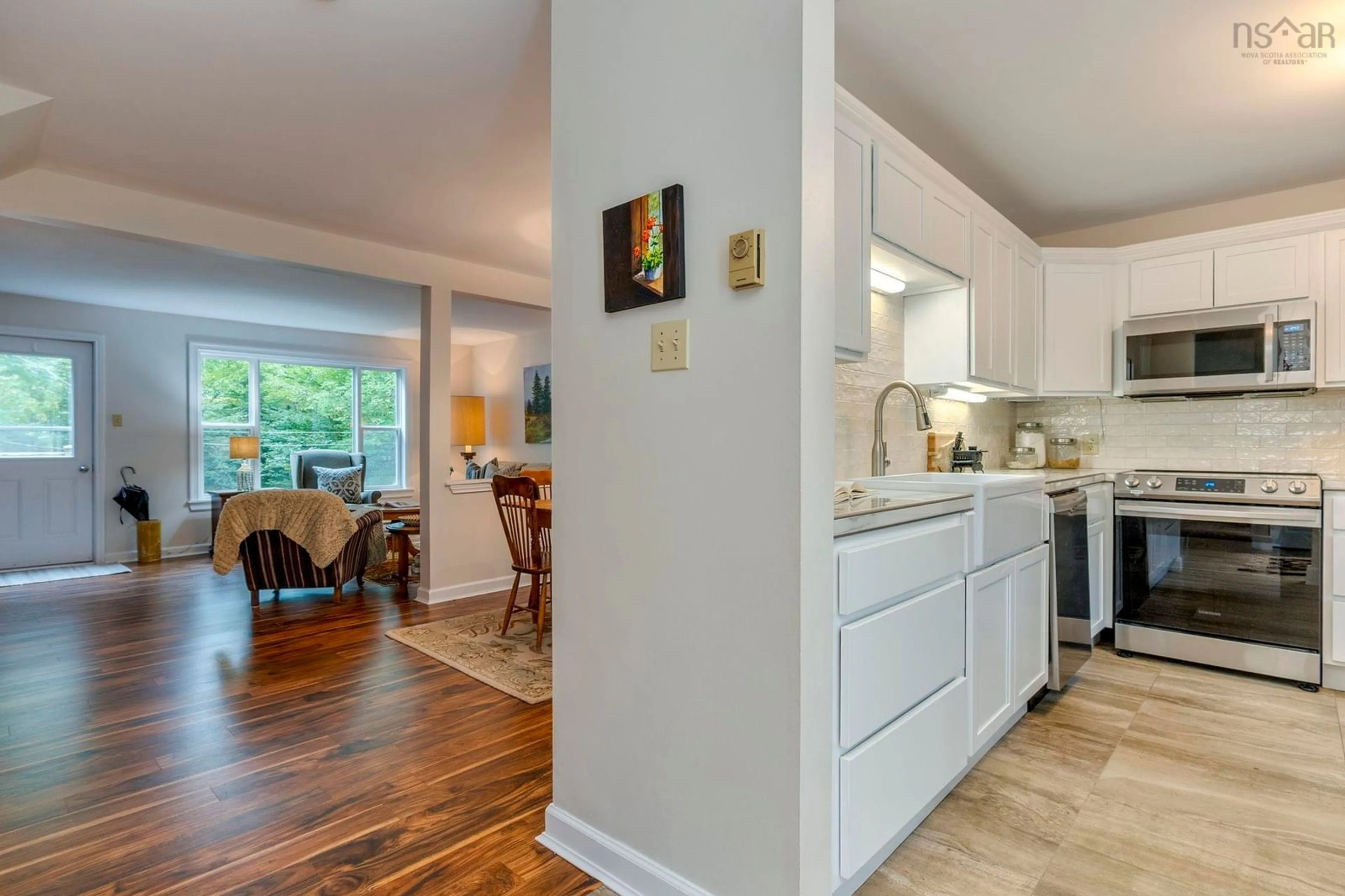 Open concept kitchen, wood/laminate floor for 56 Remington Crt, Halifax Nova Scotia B3M 4G9