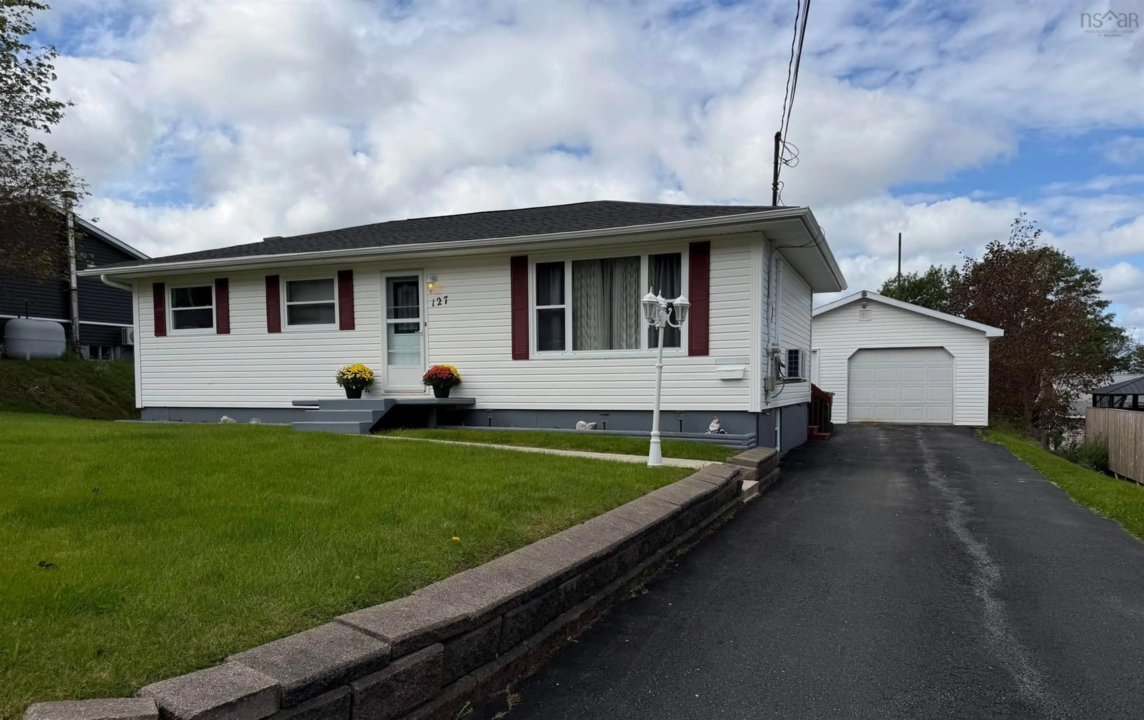 Home with vinyl exterior material, street for 127 Kennedy Ave, Sydney Nova Scotia B1P 3K9