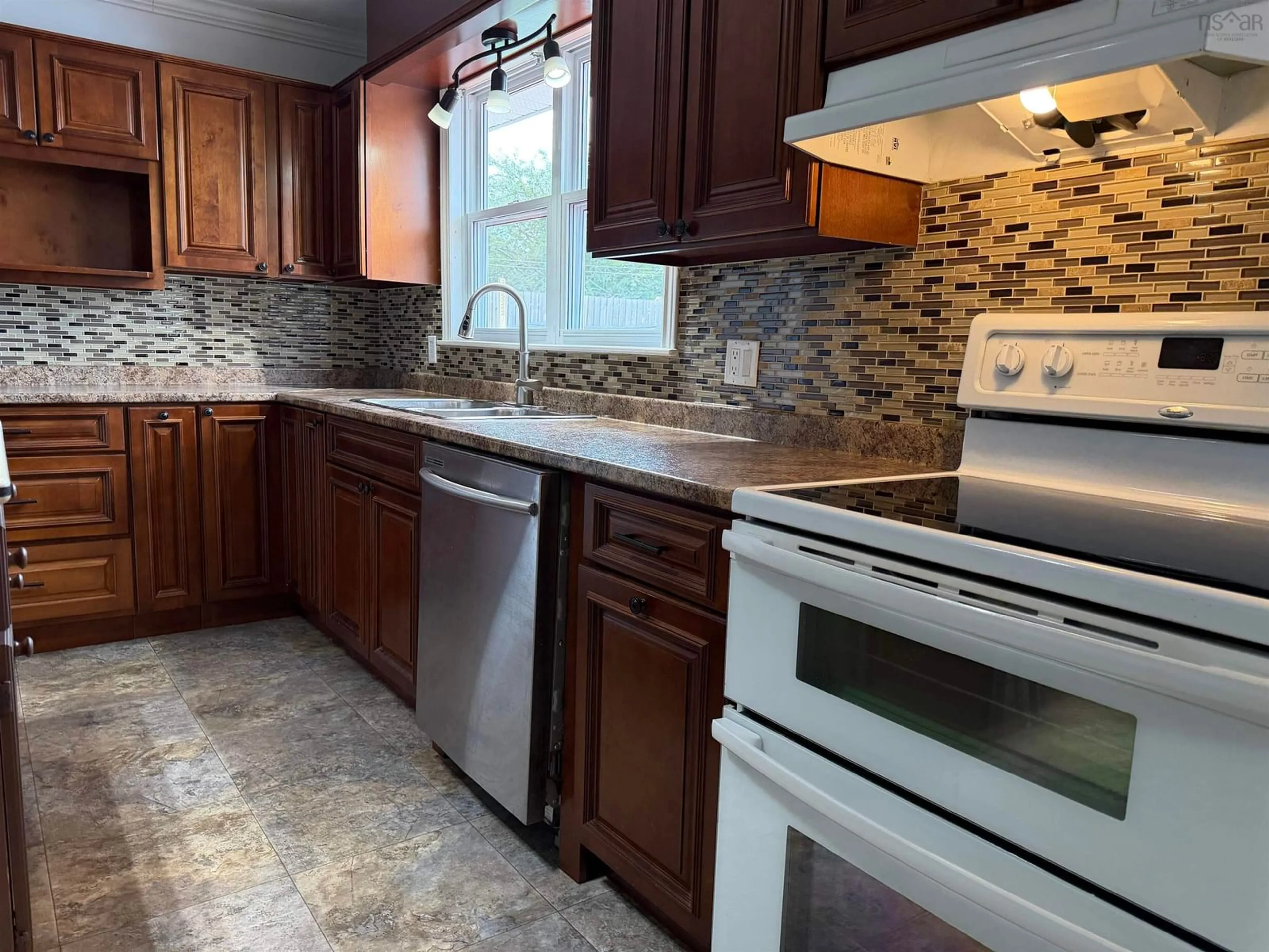 Standard kitchen, ceramic/tile floor for 127 Kennedy Ave, Sydney Nova Scotia B1P 3K9