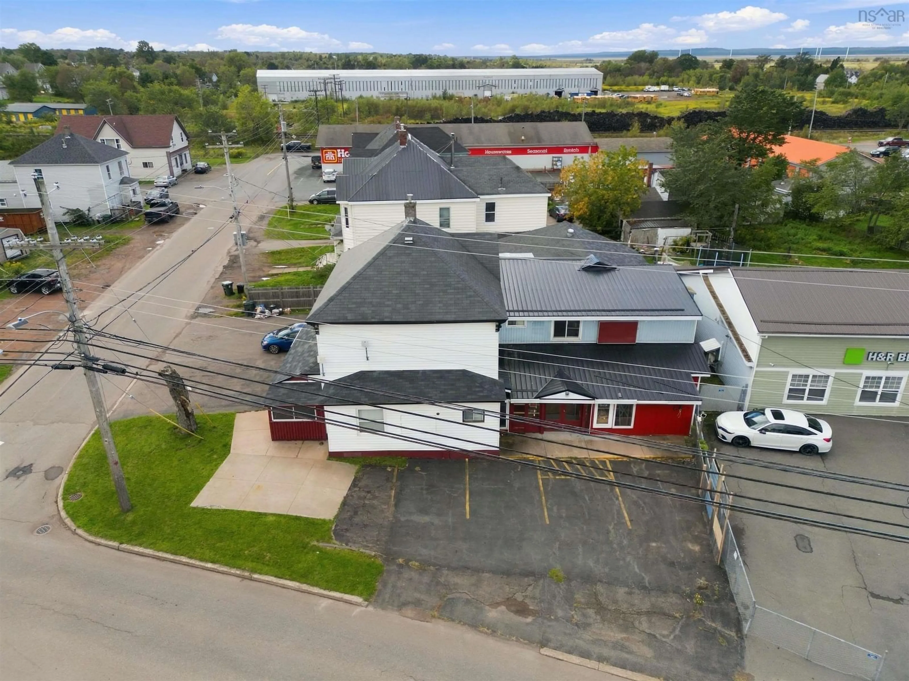 A pic from outside/outdoor area/front of a property/back of a property/a pic from drone, building for 14 Spring St, Amherst Nova Scotia B4H 1R5