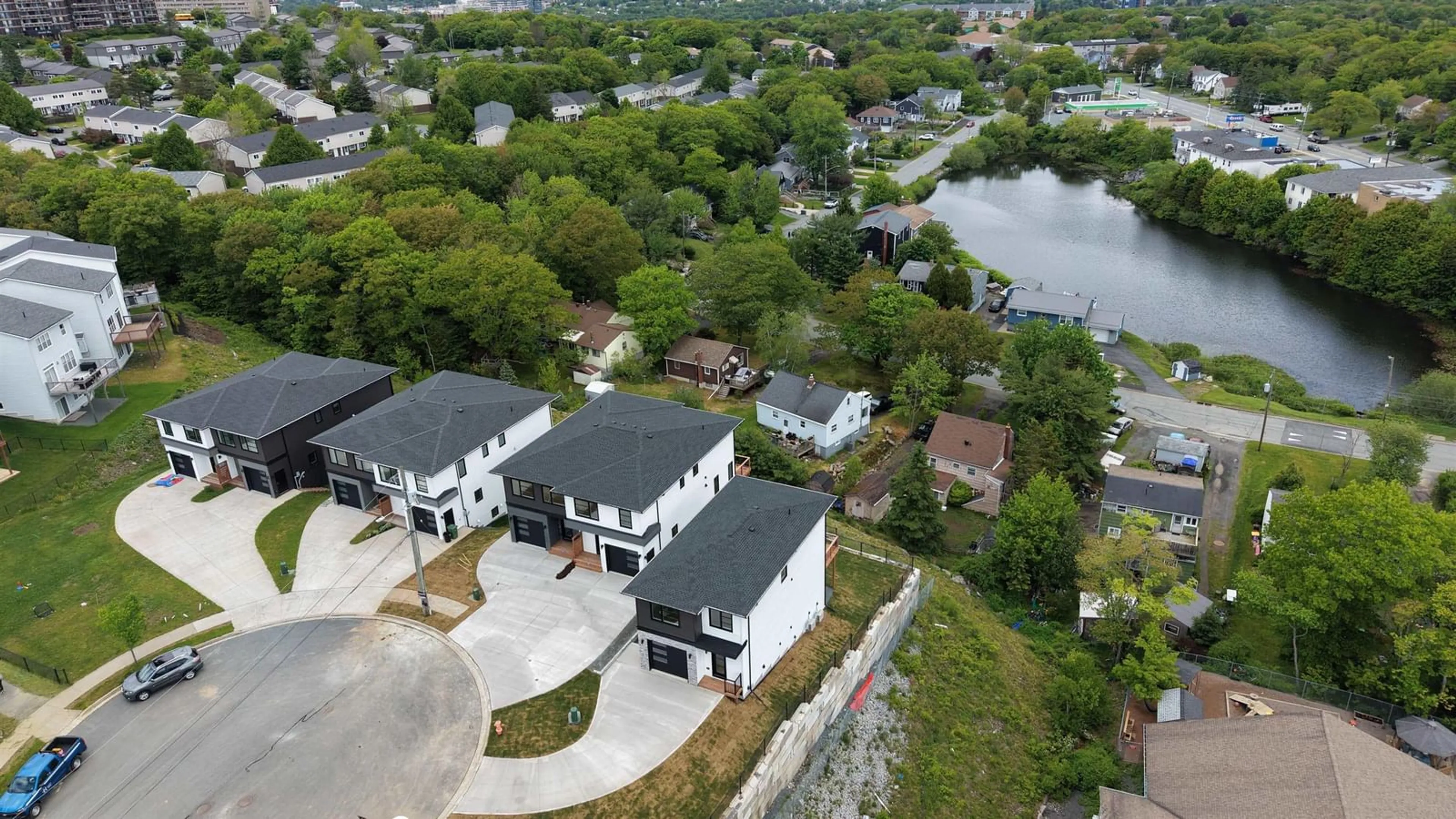 A pic from outside/outdoor area/front of a property/back of a property/a pic from drone, water/lake/river/ocean view for 65 Grenoble Crt, Long Lake Nova Scotia B3P 0J8
