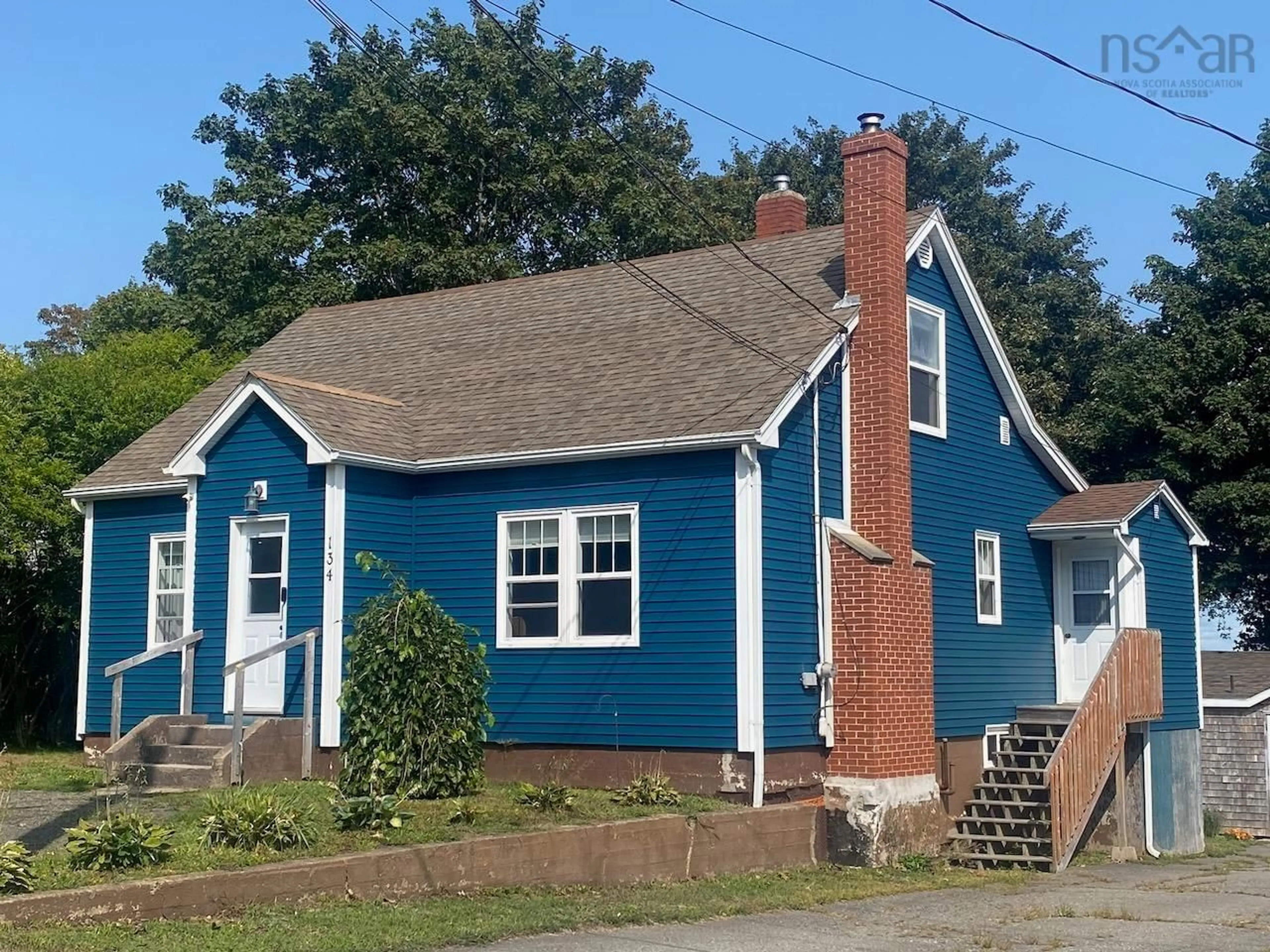 Home with vinyl exterior material, street for 134 King St, Digby Nova Scotia B0V 1A0