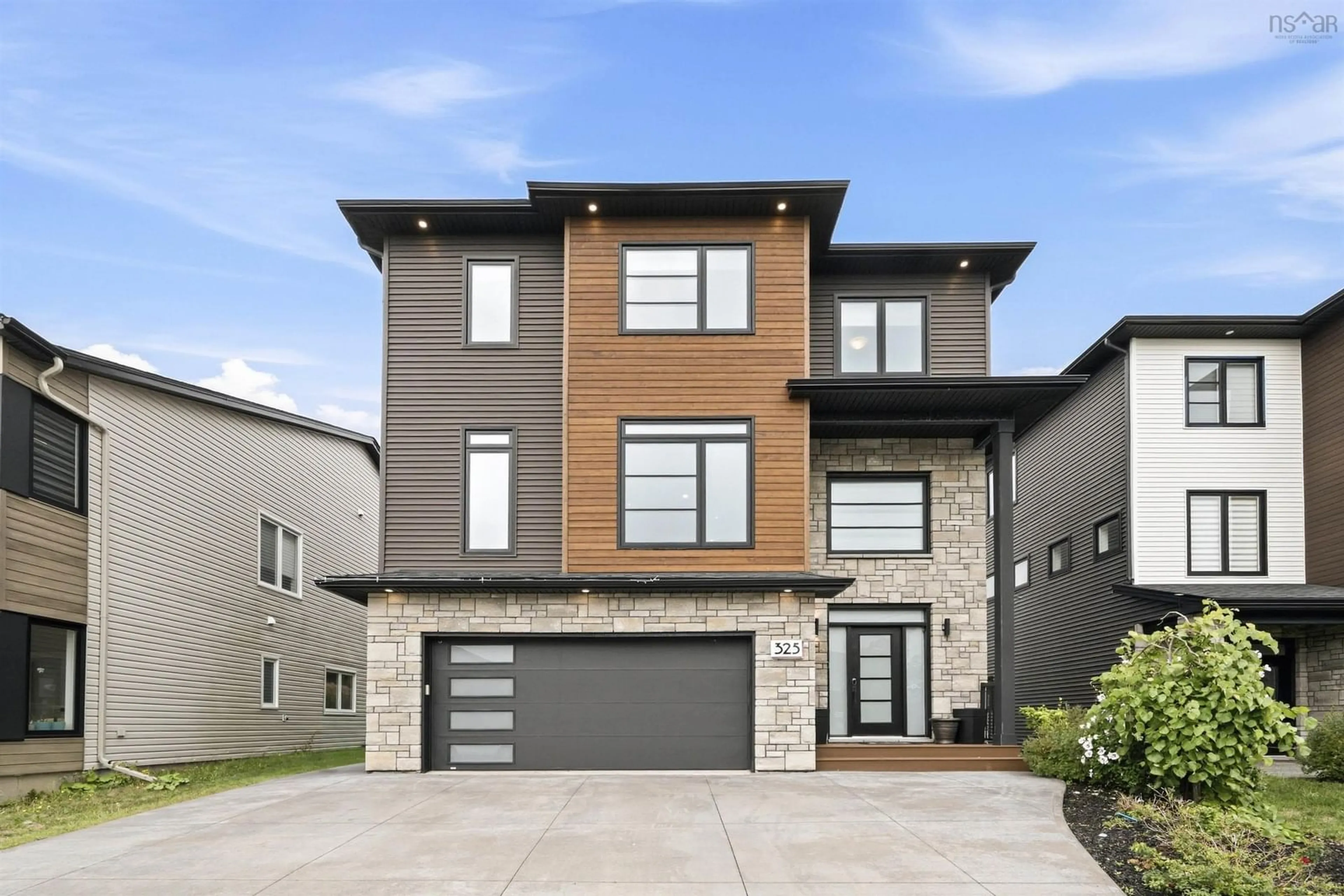 Home with brick exterior material, street for 325 Starboard Dr, Halifax Nova Scotia B3M 0L5