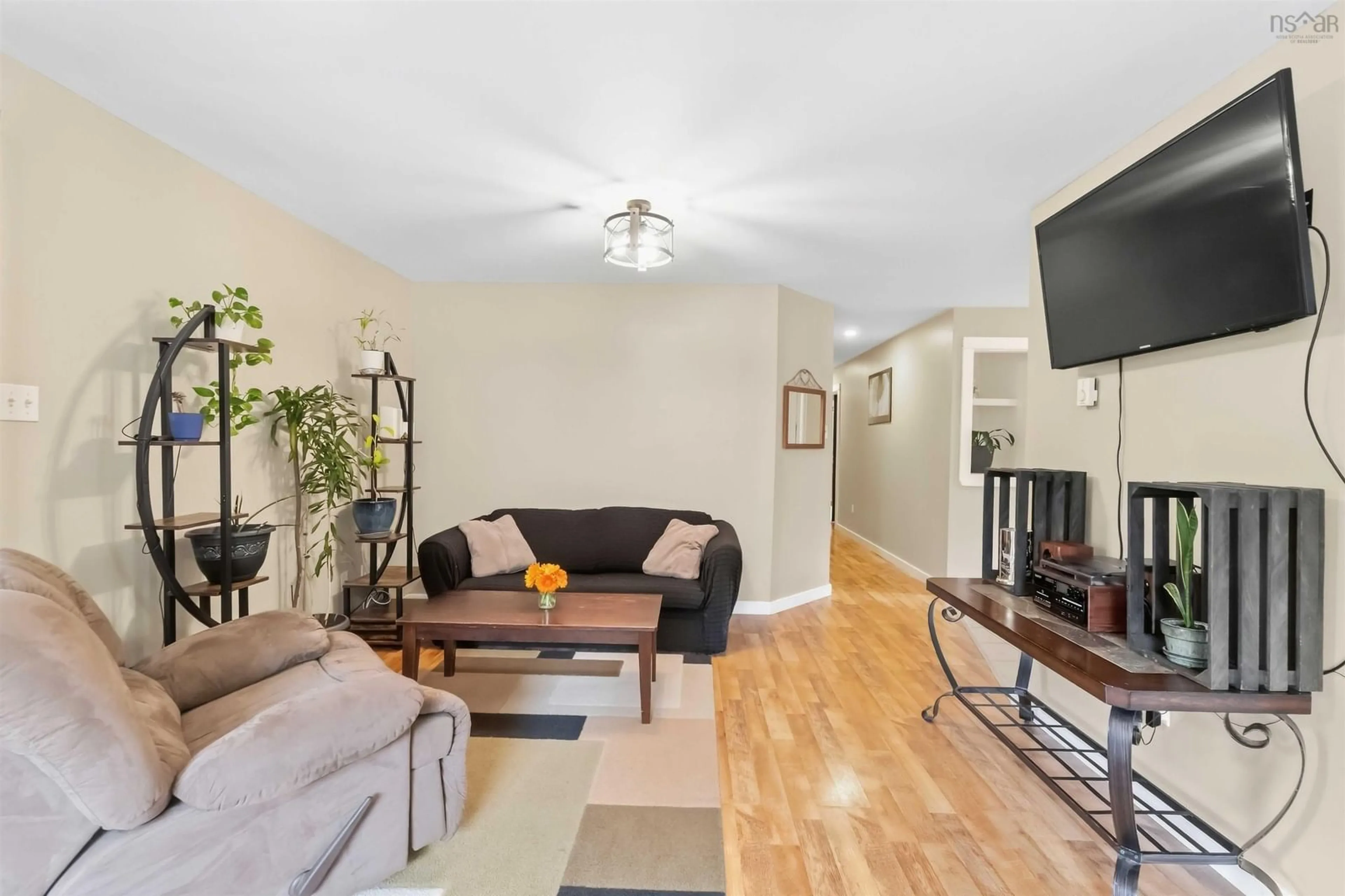 Living room with furniture, wood/laminate floor for 654 Tupper Lake Rd, Tupper Lake Nova Scotia B0P 1G0