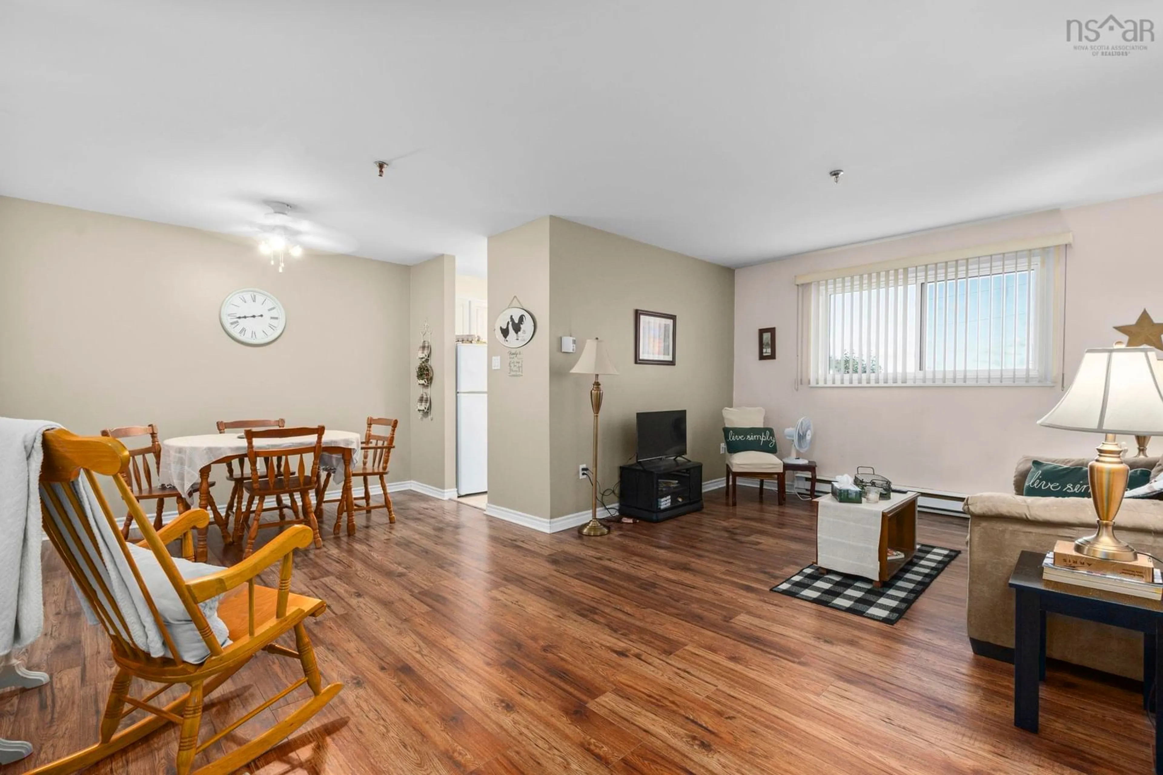 Living room with furniture, wood/laminate floor for 281 Windmill #107, Dartmouth Nova Scotia B3A 4P9