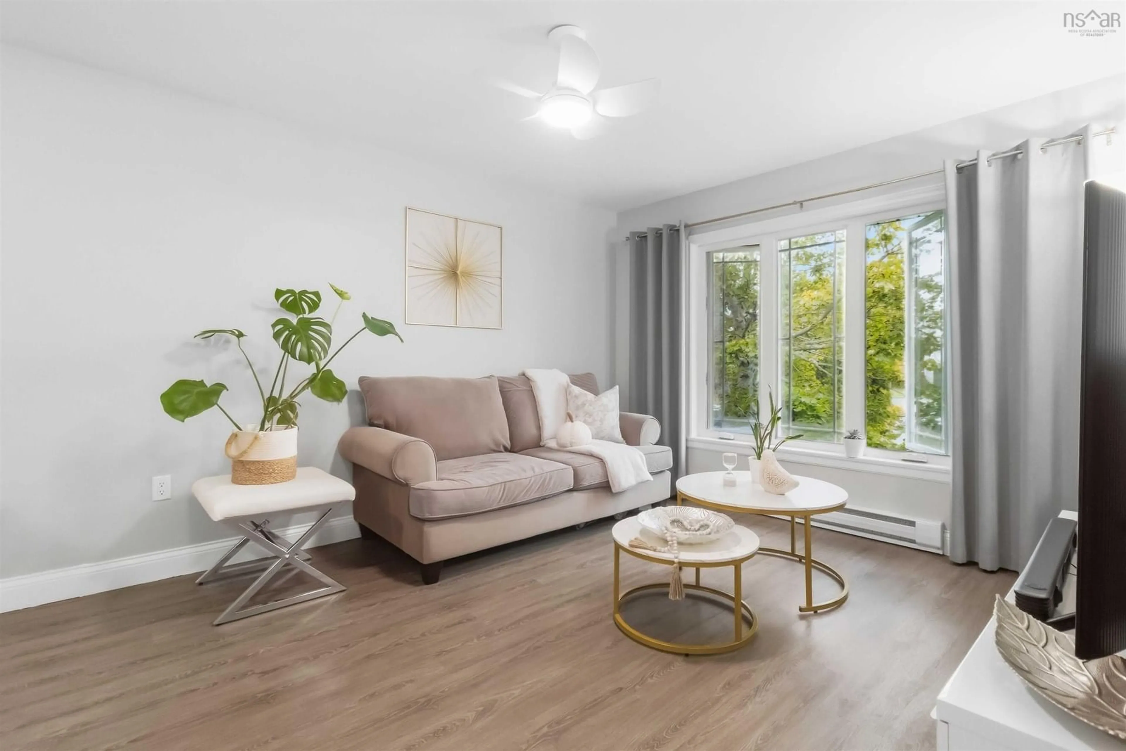 Living room with furniture, wood/laminate floor for 34 Lindsay Crt, Lower Sackville Nova Scotia B4E 2K1