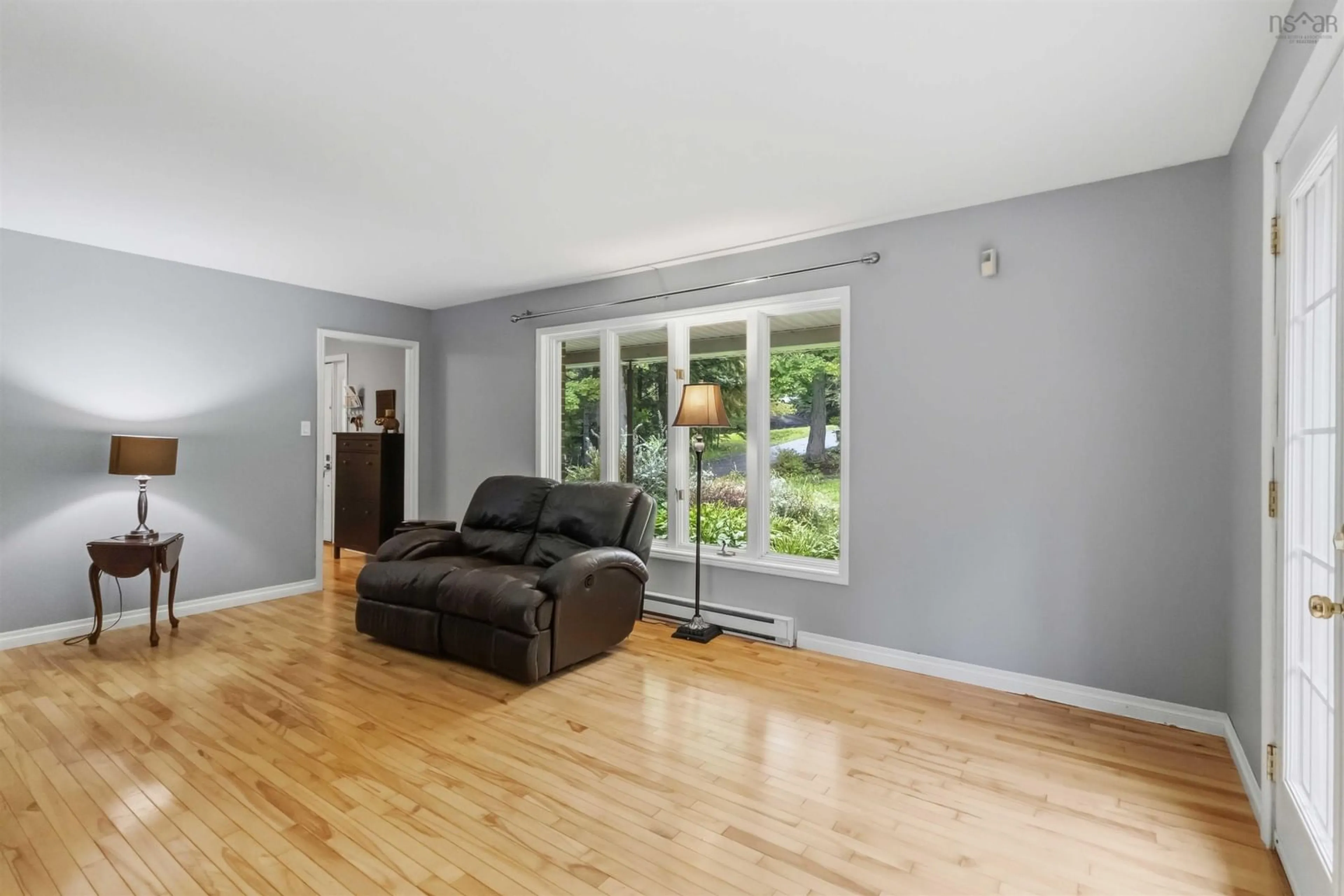 Living room with furniture, wood/laminate floor for 251 Howe Avenue Ave, Fall River Nova Scotia B2T 1H7