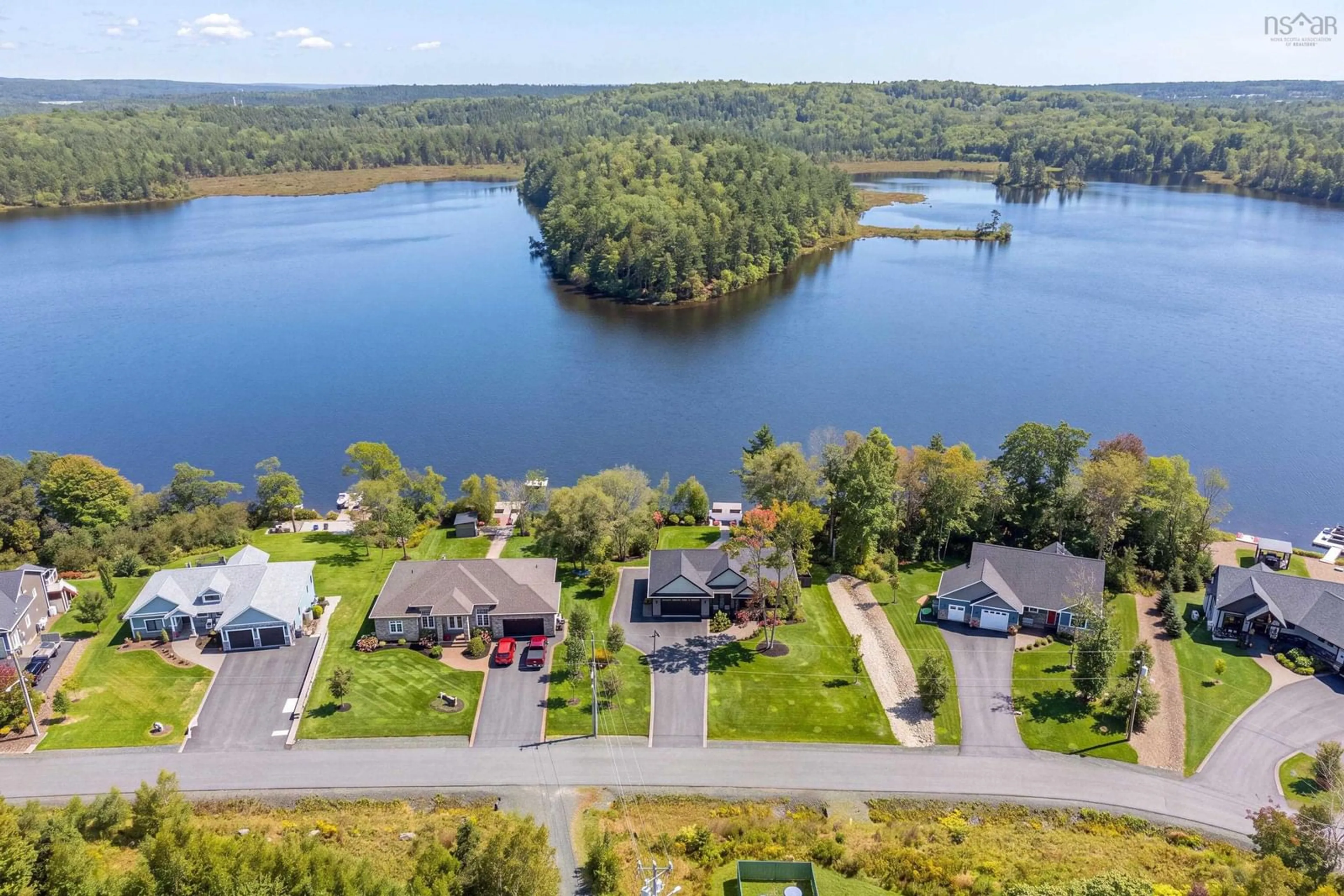 A pic from outside/outdoor area/front of a property/back of a property/a pic from drone, water/lake/river/ocean view for 70 Everlina Lane, Windsor Junction Nova Scotia B2T 0T3