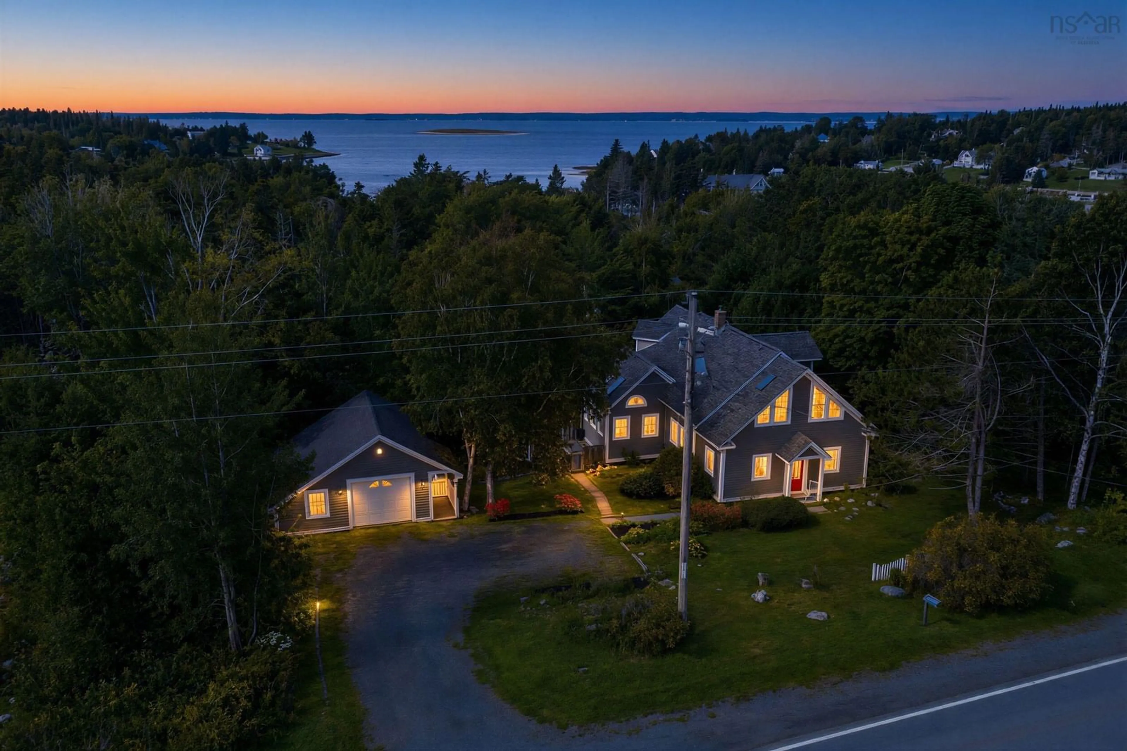 A pic from outside/outdoor area/front of a property/back of a property/a pic from drone, water/lake/river/ocean view for 11278 Peggys Cove Rd, Seabright Nova Scotia B3Z 3B1