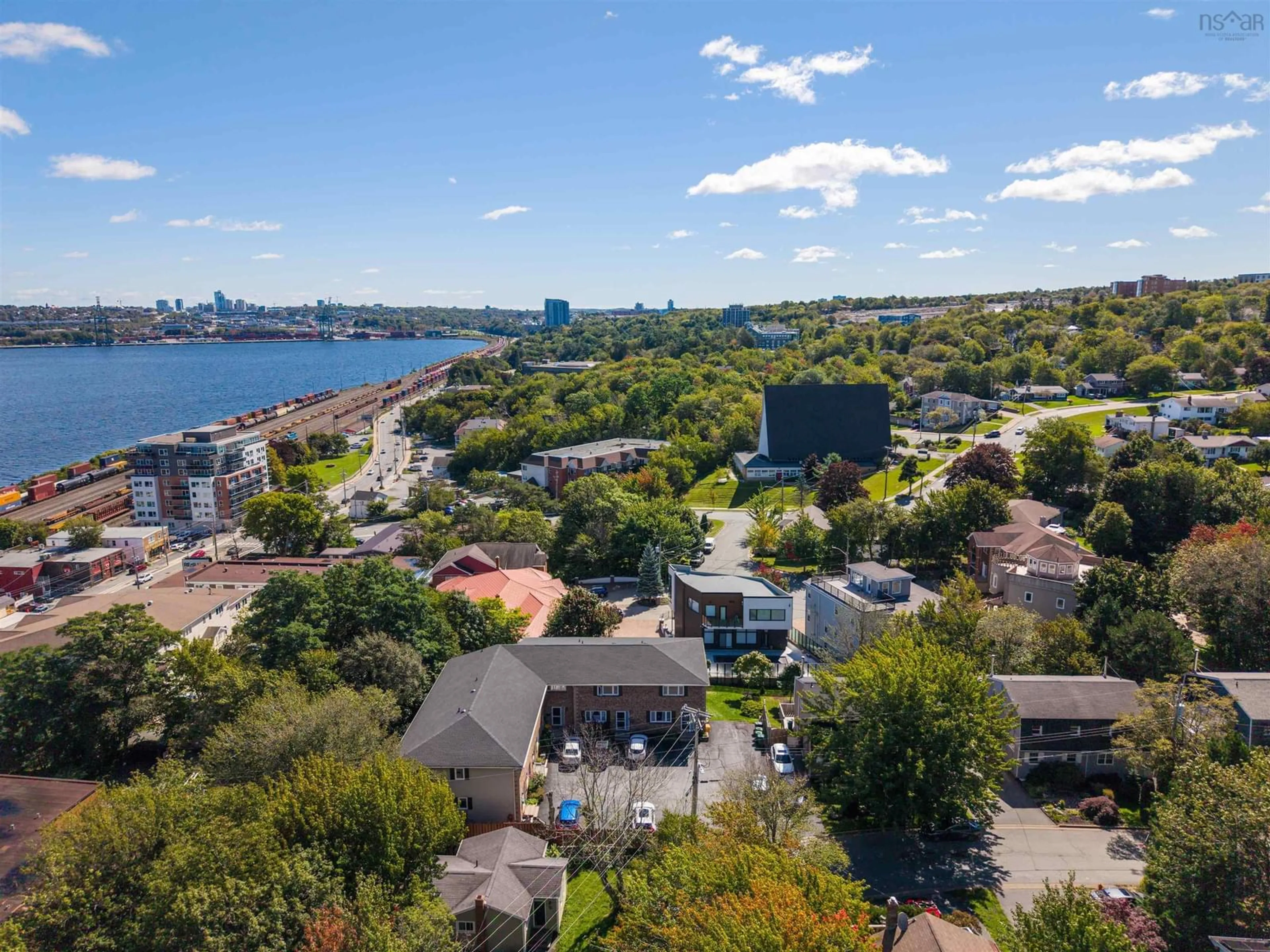 A pic from outside/outdoor area/front of a property/back of a property/a pic from drone, water/lake/river/ocean view for 18 A Pioneer Ave #1, Halifax Nova Scotia B3M 1W8