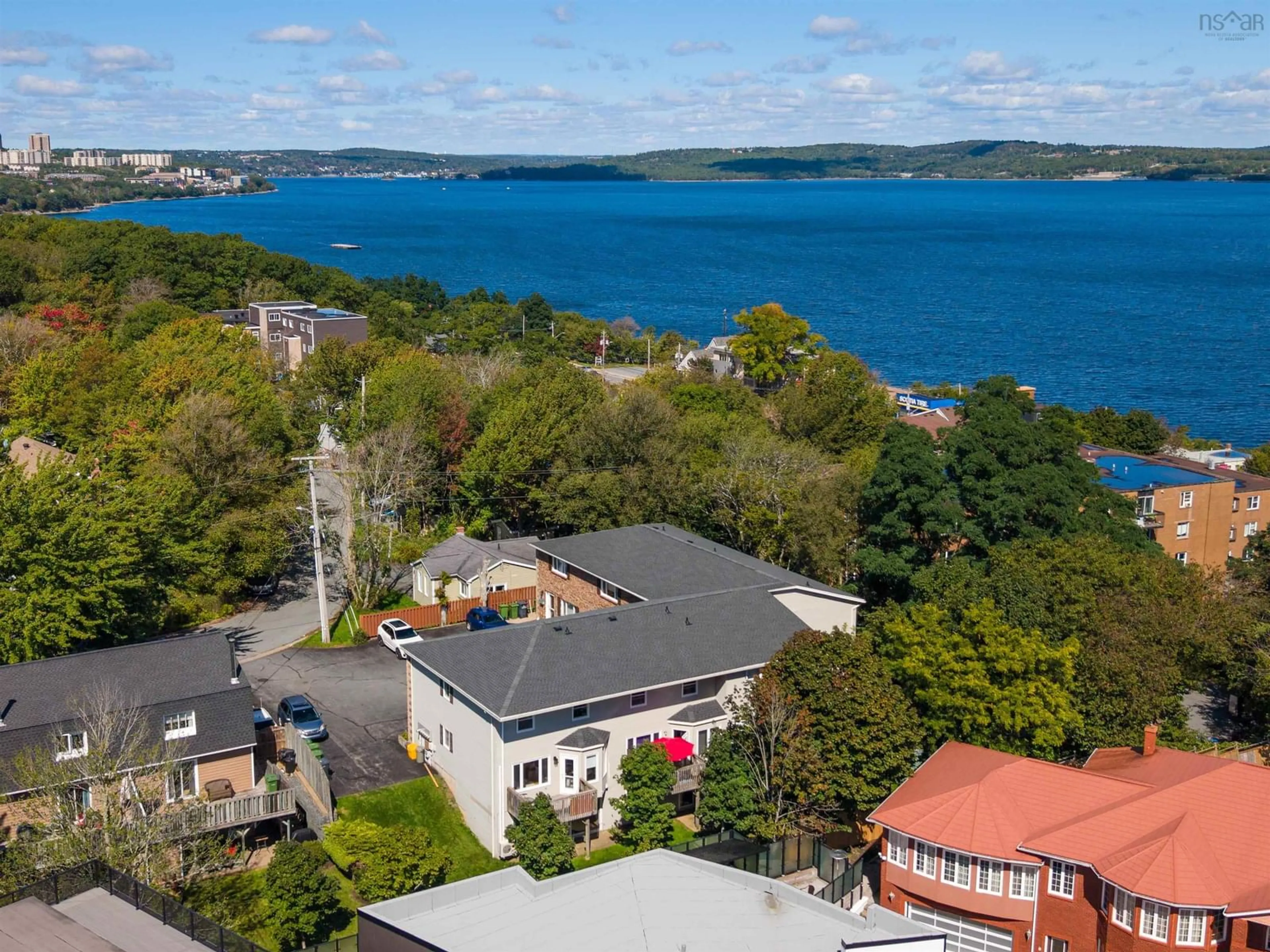 A pic from outside/outdoor area/front of a property/back of a property/a pic from drone, water/lake/river/ocean view for 18 A Pioneer Ave #1, Halifax Nova Scotia B3M 1W8