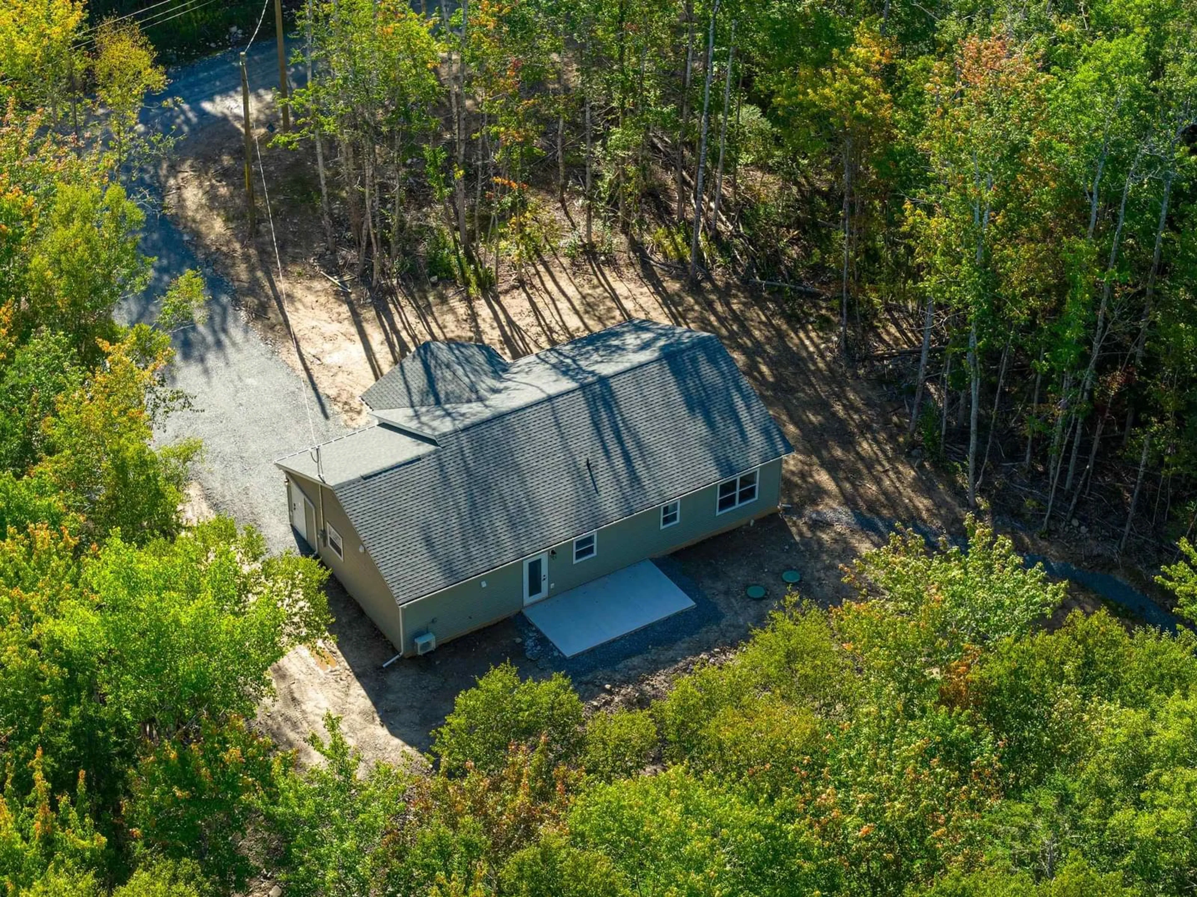 A pic from outside/outdoor area/front of a property/back of a property/a pic from drone, forest/trees view for 62 Ronald Lane, East Uniacke Nova Scotia B0N 1Z0
