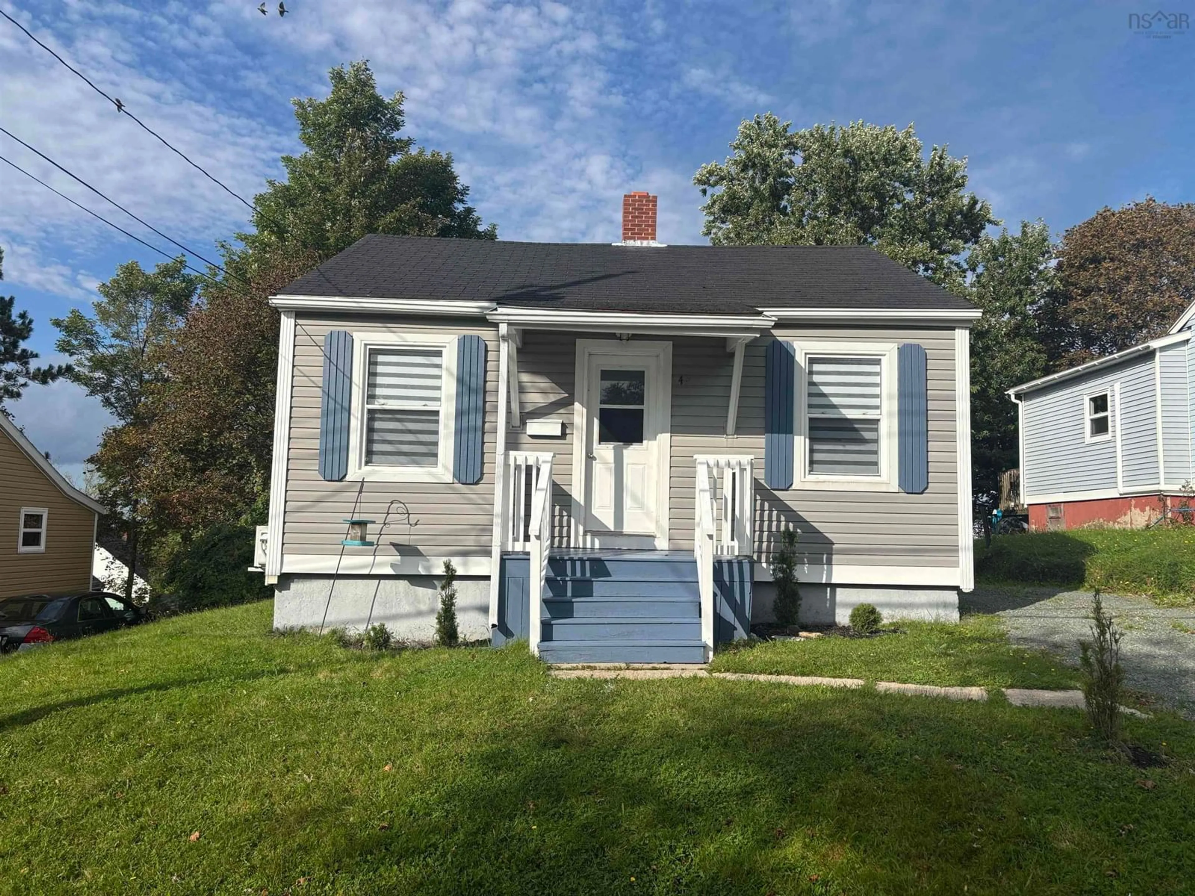 Home with vinyl exterior material, street for 49 Mechanic St, Trenton Nova Scotia B0K 1X0