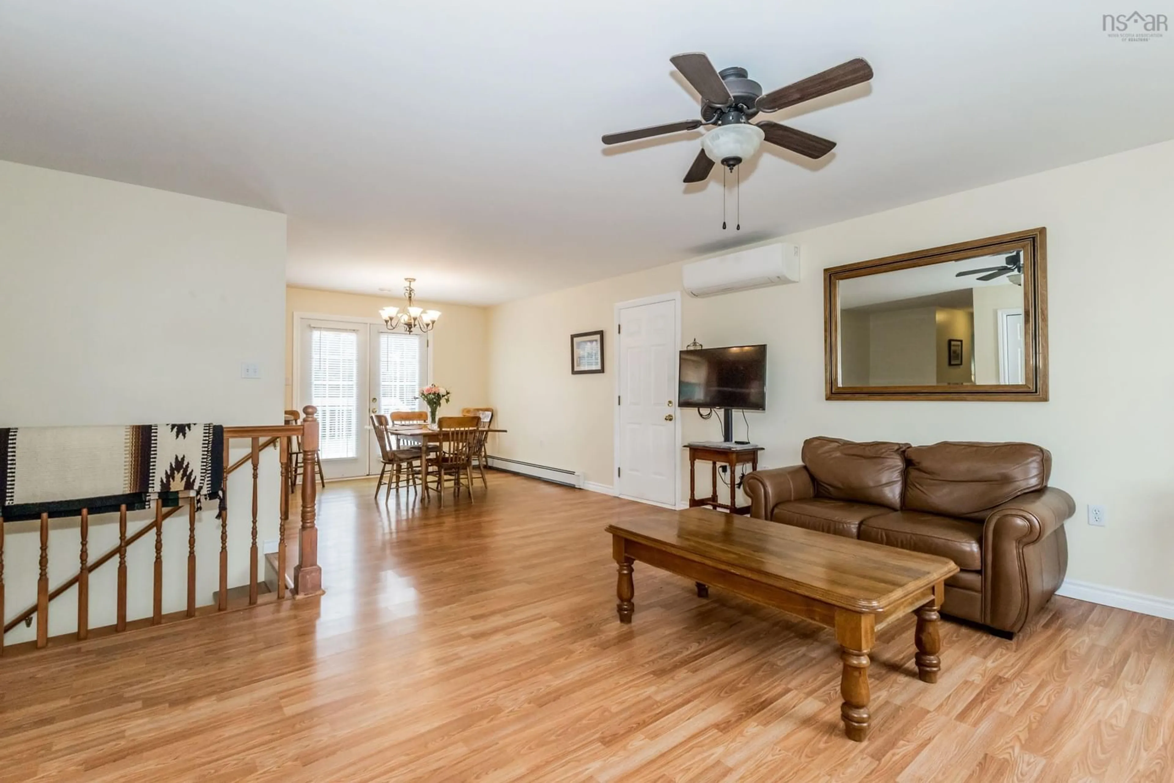 Living room with furniture, wood/laminate floor for 2 Cameron Dr, Melvern Square Nova Scotia B0P 1R0