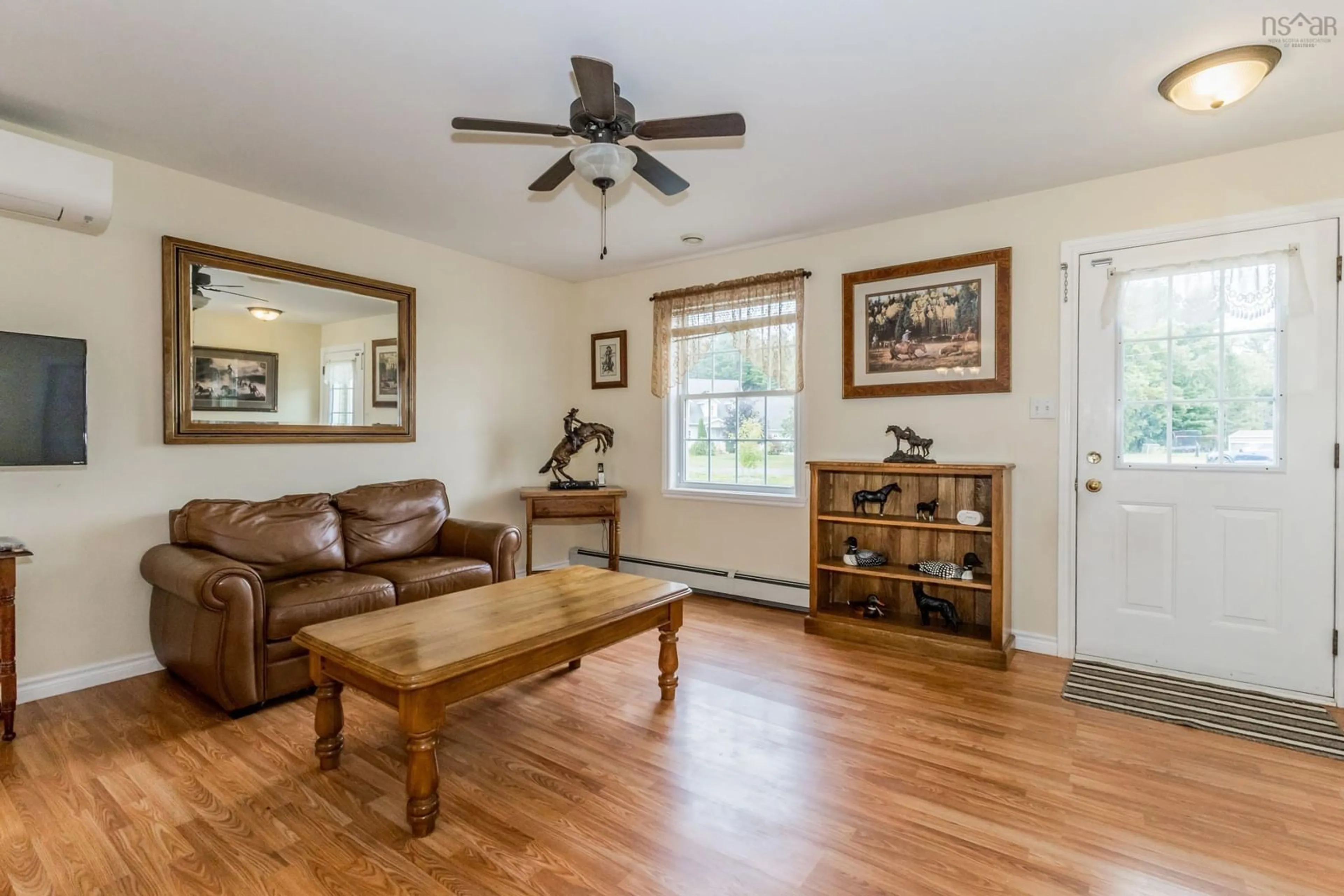 Living room with furniture, wood/laminate floor for 2 Cameron Dr, Melvern Square Nova Scotia B0P 1R0