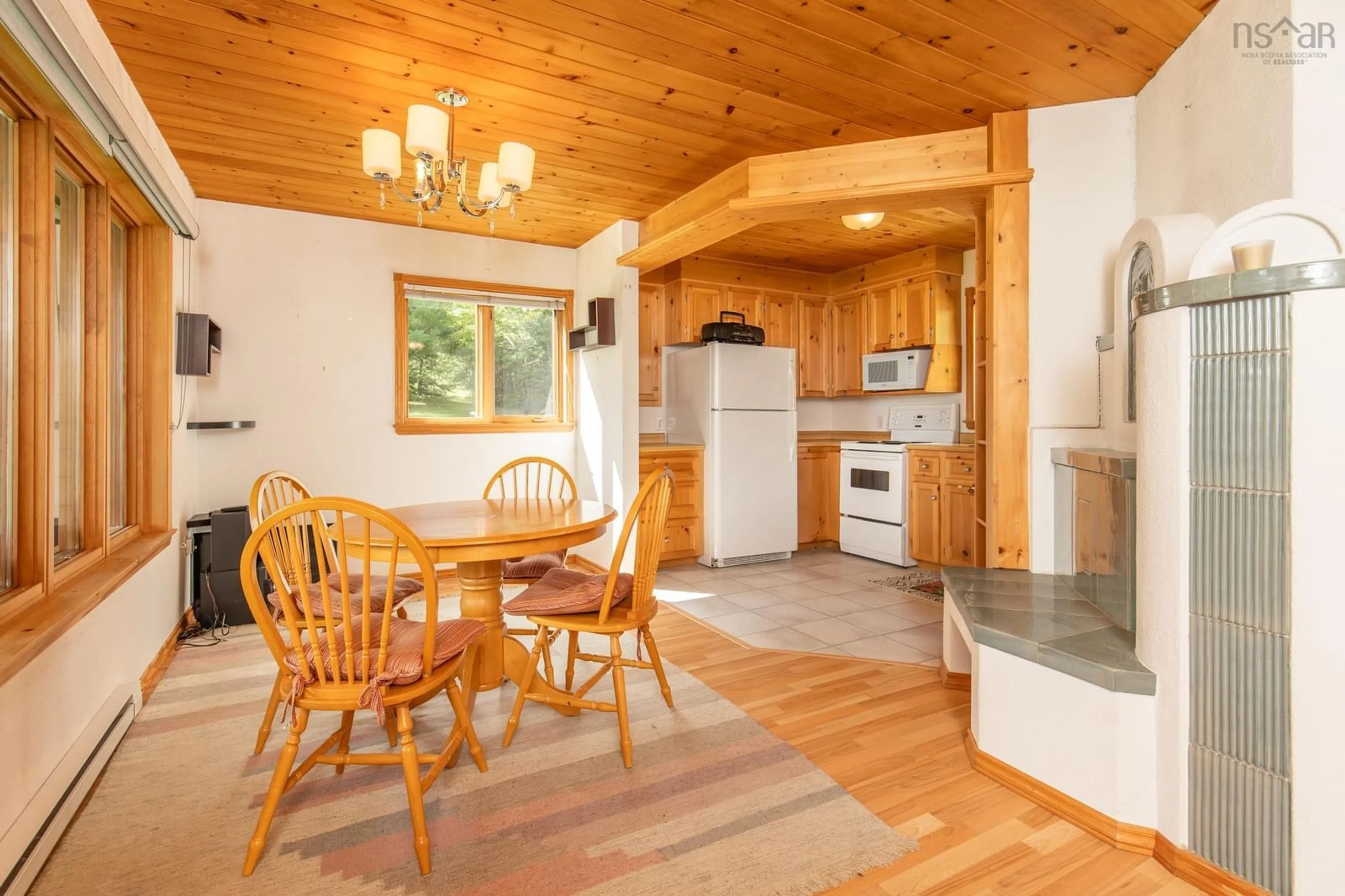 Open concept kitchen, wood/laminate floor for 100 Whispering Pine Dr, Canaan Nova Scotia B5A 5R3