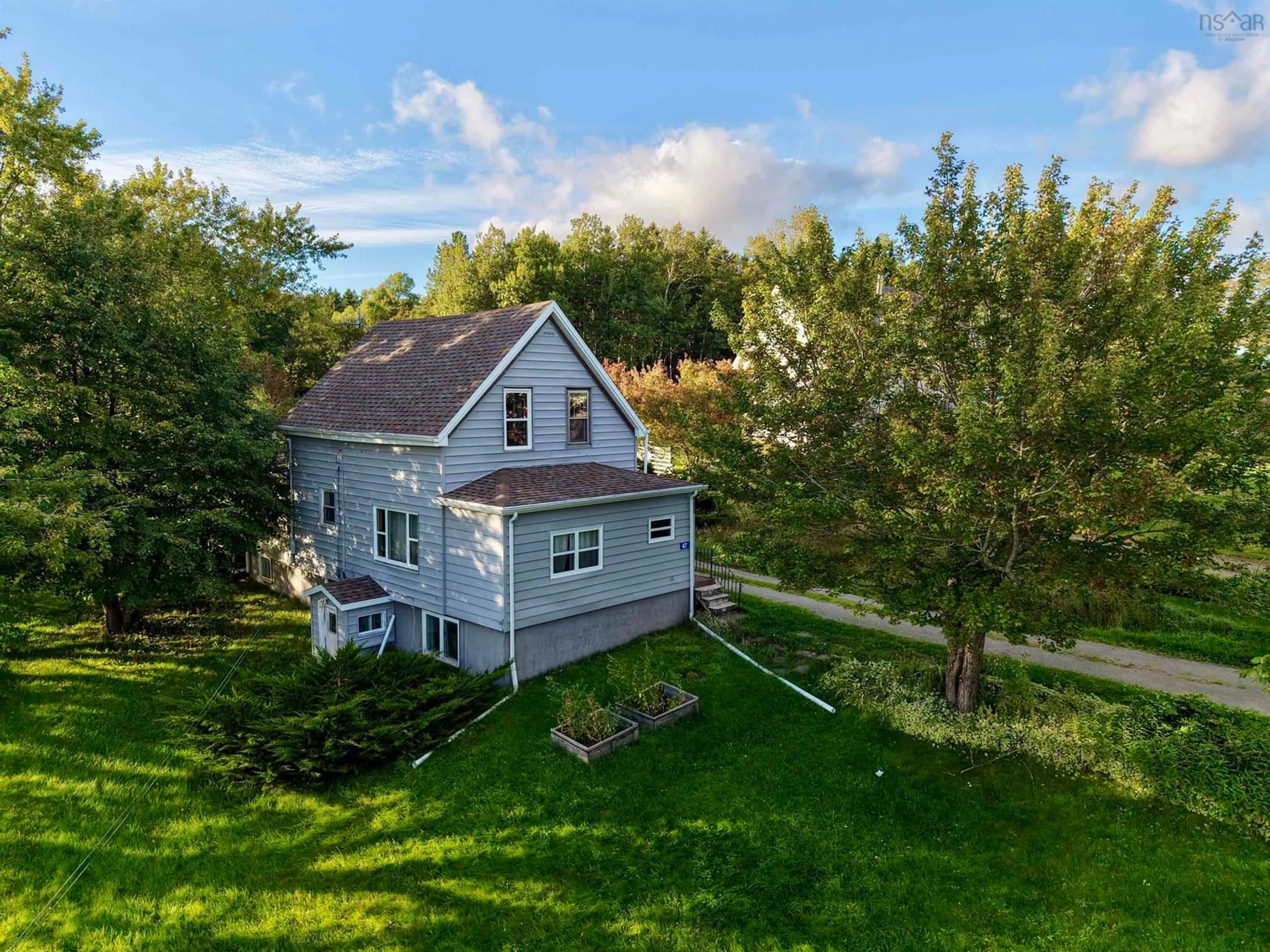 A pic from outside/outdoor area/front of a property/back of a property/a pic from drone, unknown for 47 Old Victoria Road, Port Hastings Nova Scotia B9A 1L2
