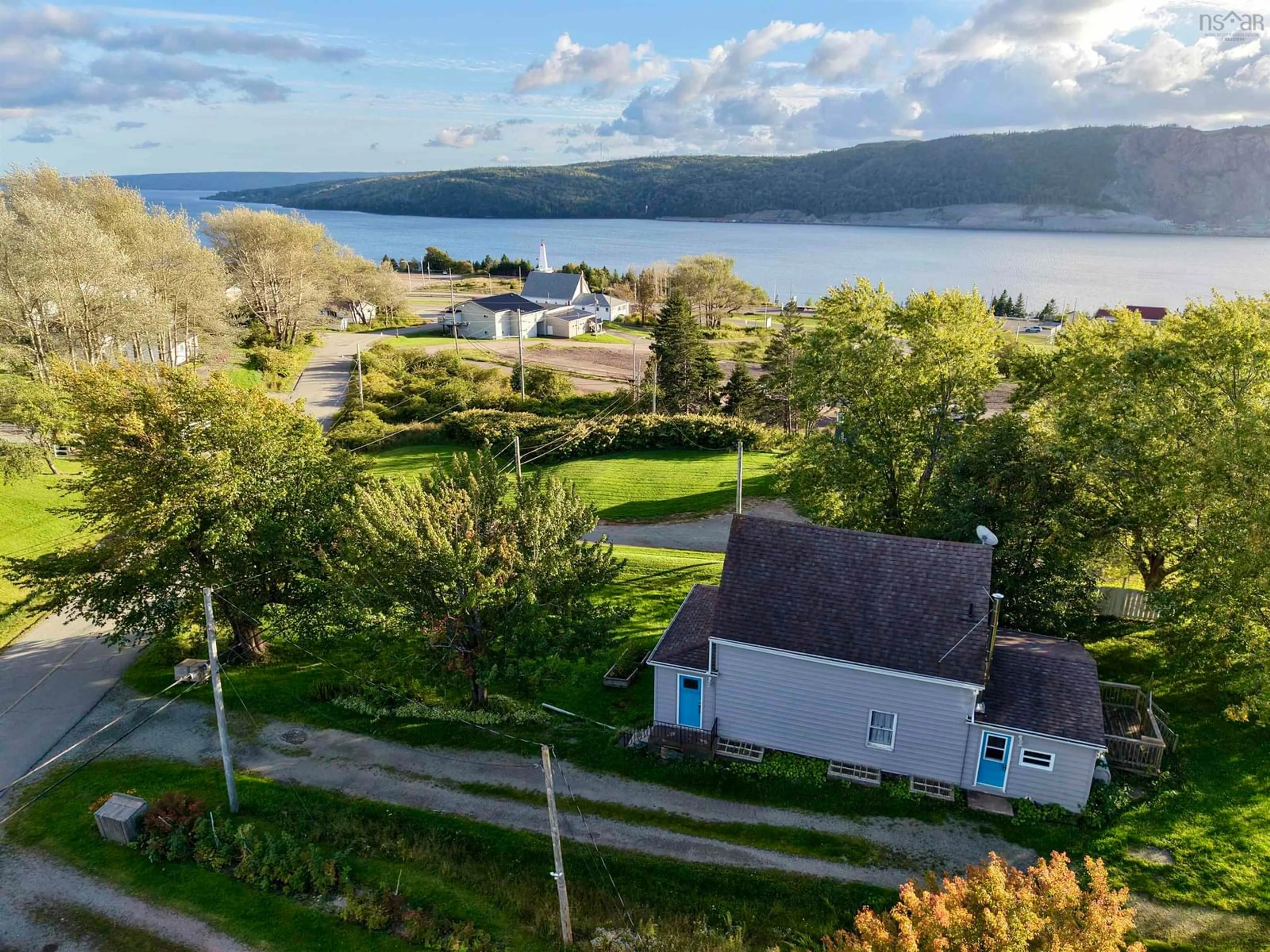 A pic from outside/outdoor area/front of a property/back of a property/a pic from drone, water/lake/river/ocean view for 47 Old Victoria Road, Port Hastings Nova Scotia B9A 1L2