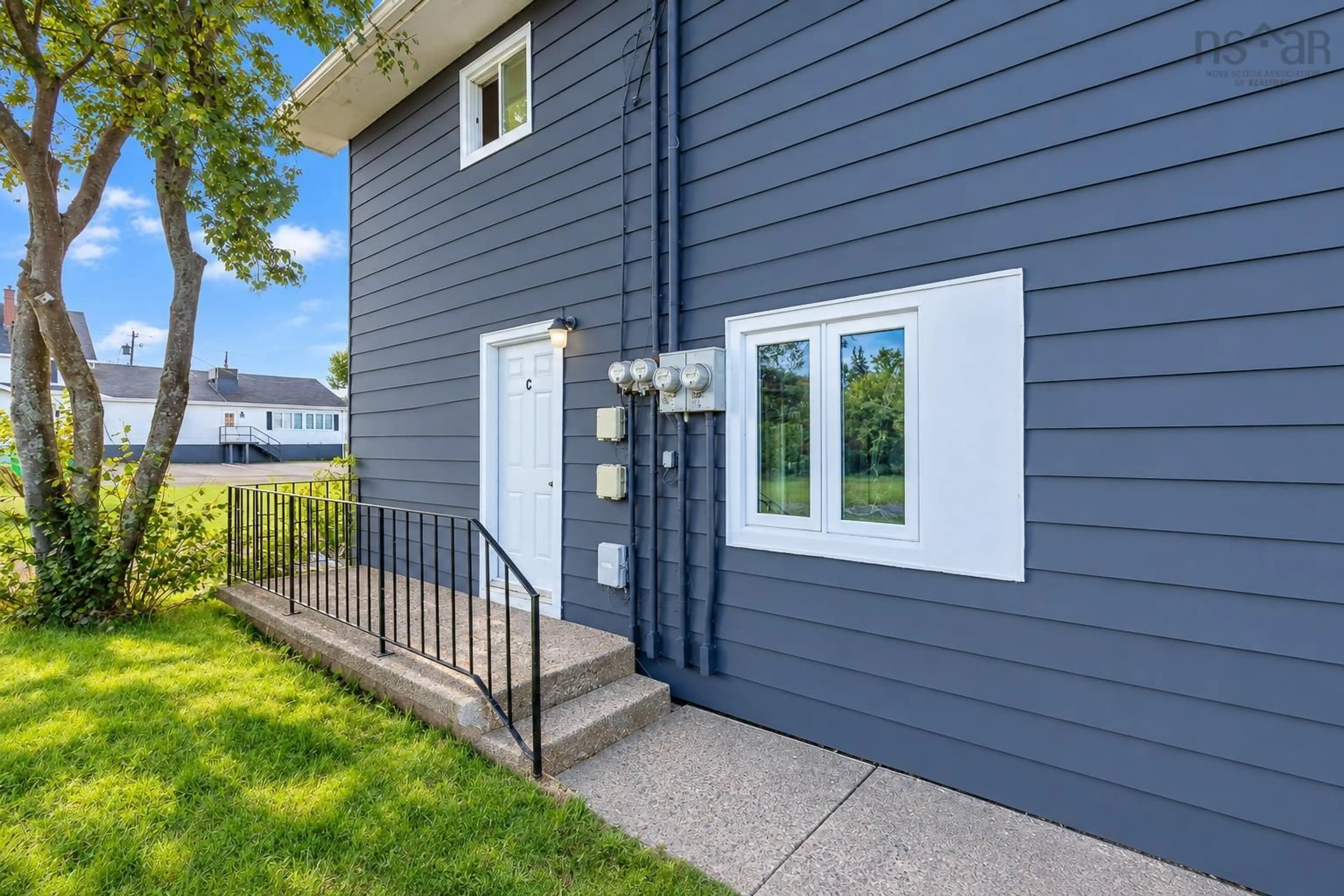 Home with vinyl exterior material, street for 379 Eighth St, New Waterford Nova Scotia B1H 3S6